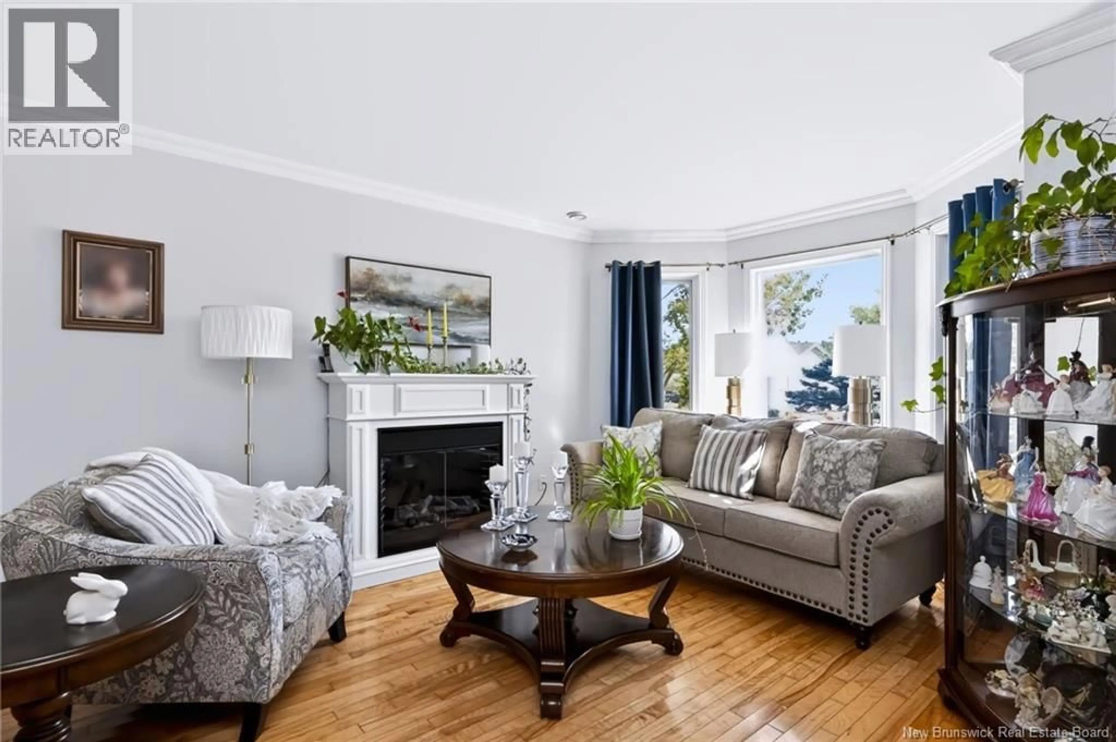 Living room with furniture, wood/laminate floor for 10 CULLINAN AVENUE, Saint John New Brunswick E2M7X5