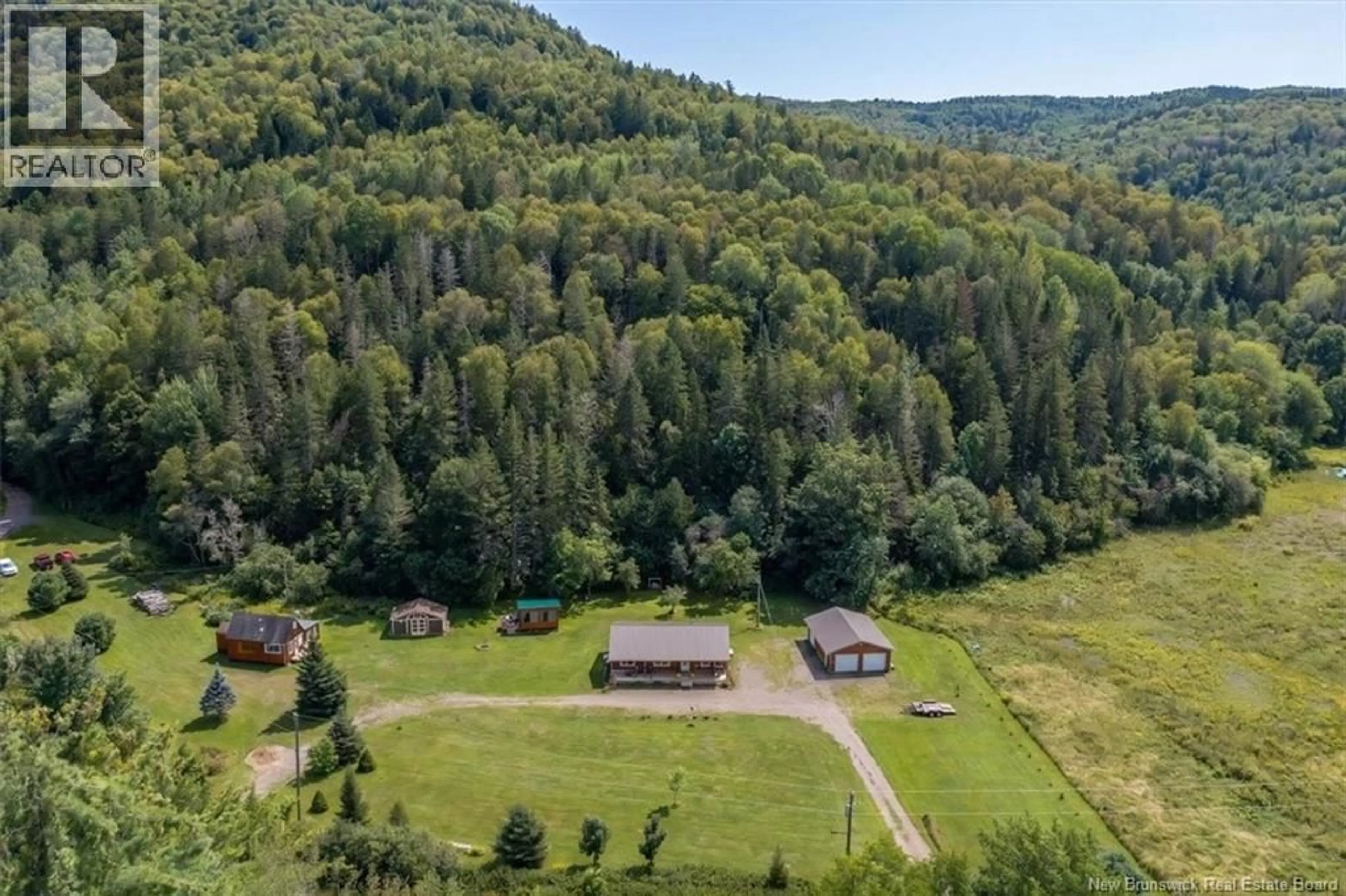 A pic from outside/outdoor area/front of a property/back of a property/a pic from drone, forest/trees view for 160 CREEK ROAD, Waterford New Brunswick E4E4L8