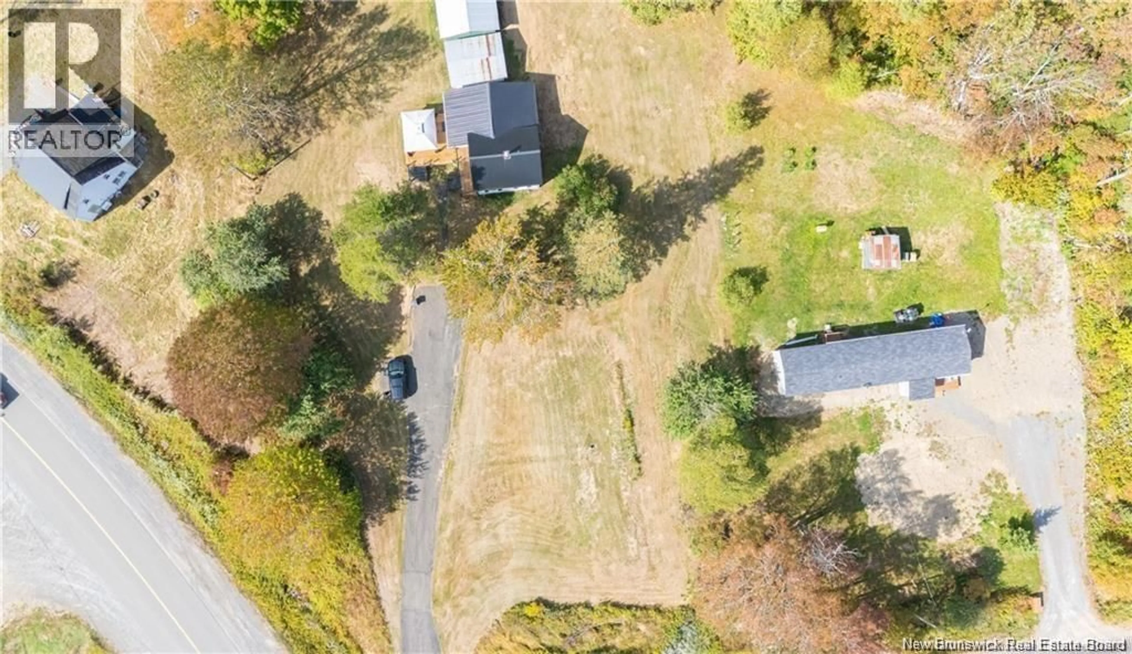 A pic from outside/outdoor area/front of a property/back of a property/a pic from drone, street for 3222 ROUTE 104, Upper Hainesville New Brunswick E6E1J1