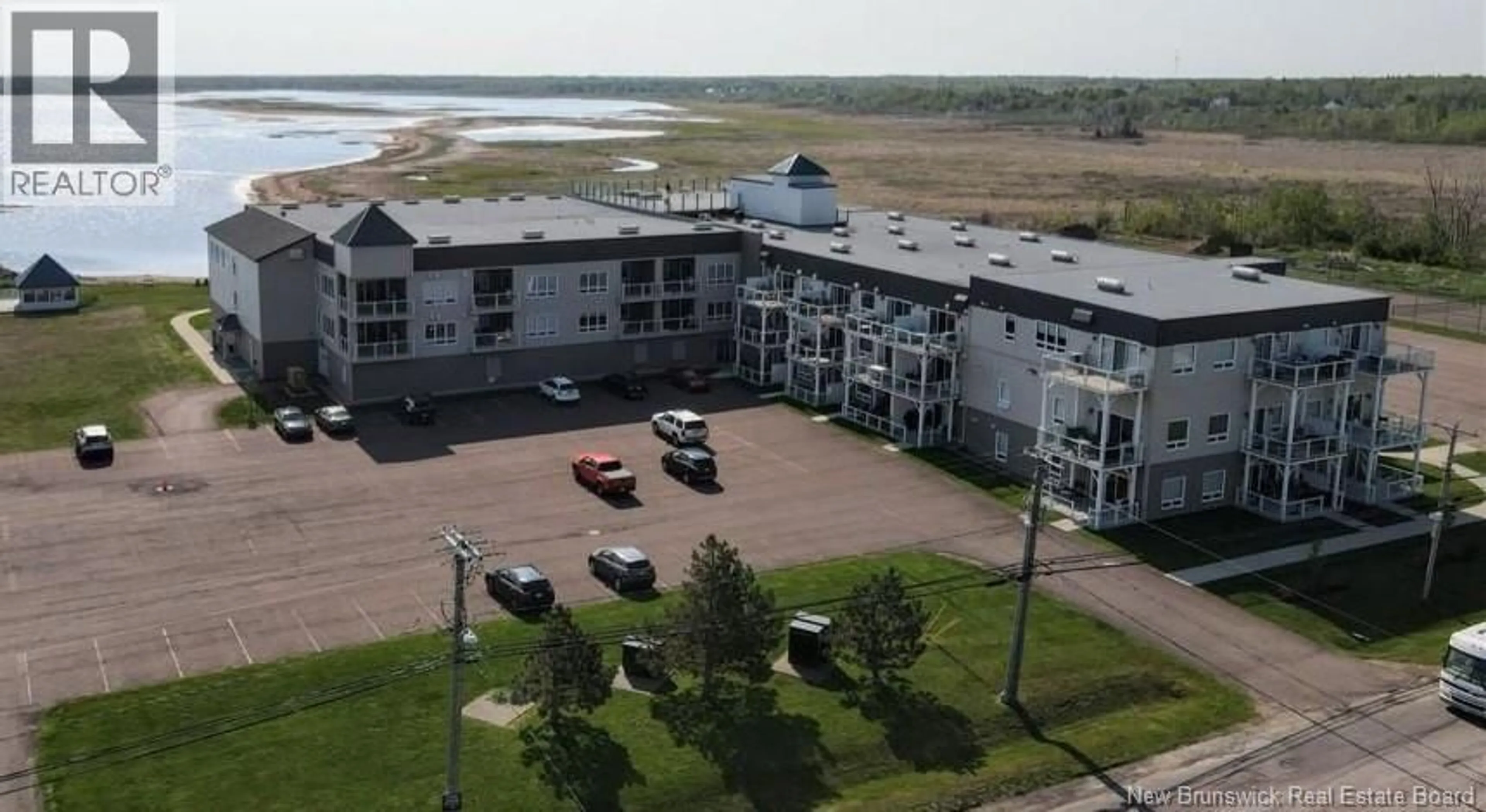 A pic from outside/outdoor area/front of a property/back of a property/a pic from drone, water/lake/river/ocean view for 120 - 69 CAP BIMET, Grand-Barachois New Brunswick E4P6X5