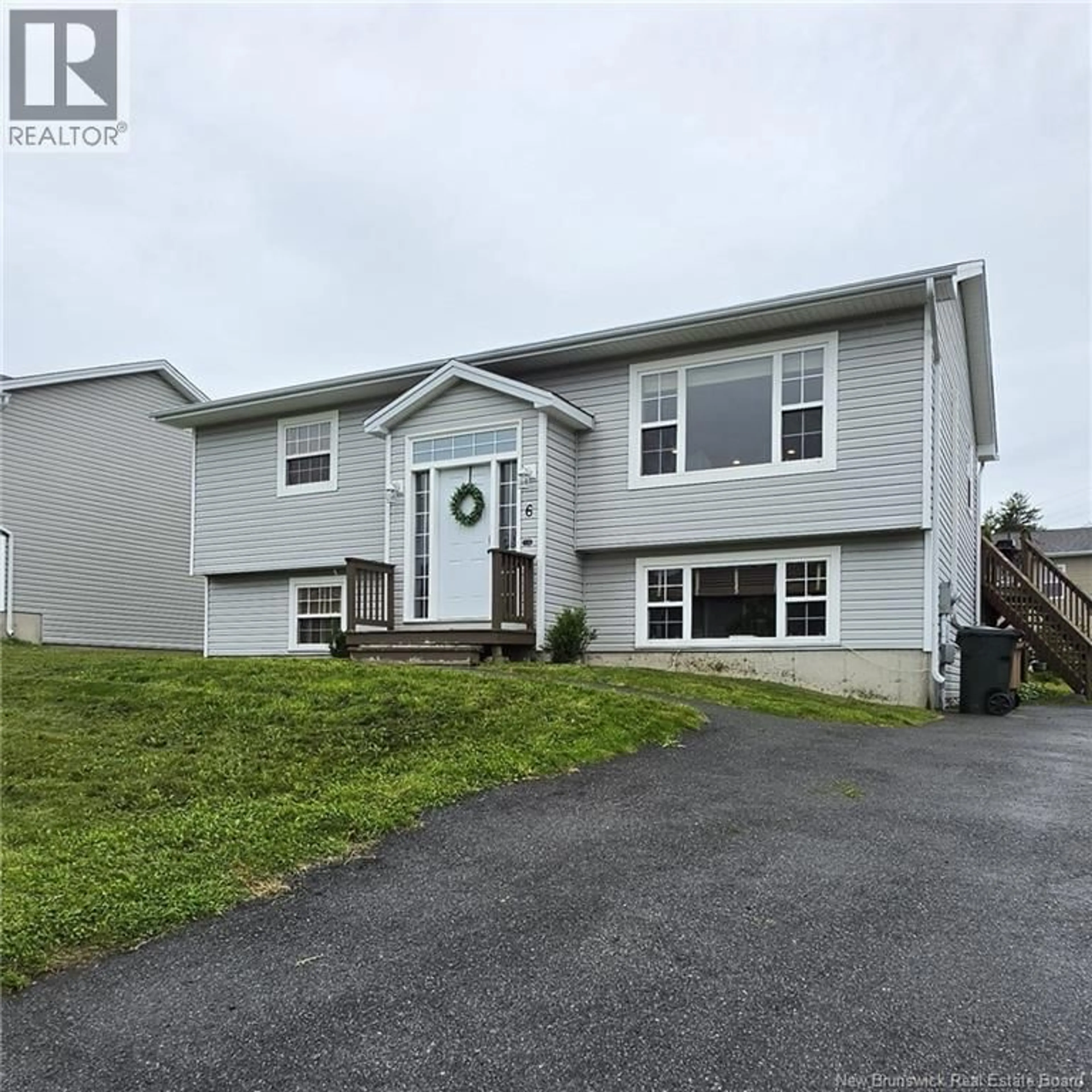 Home with vinyl exterior material, street for 6 FALCON, Saint John New Brunswick E2J0C4