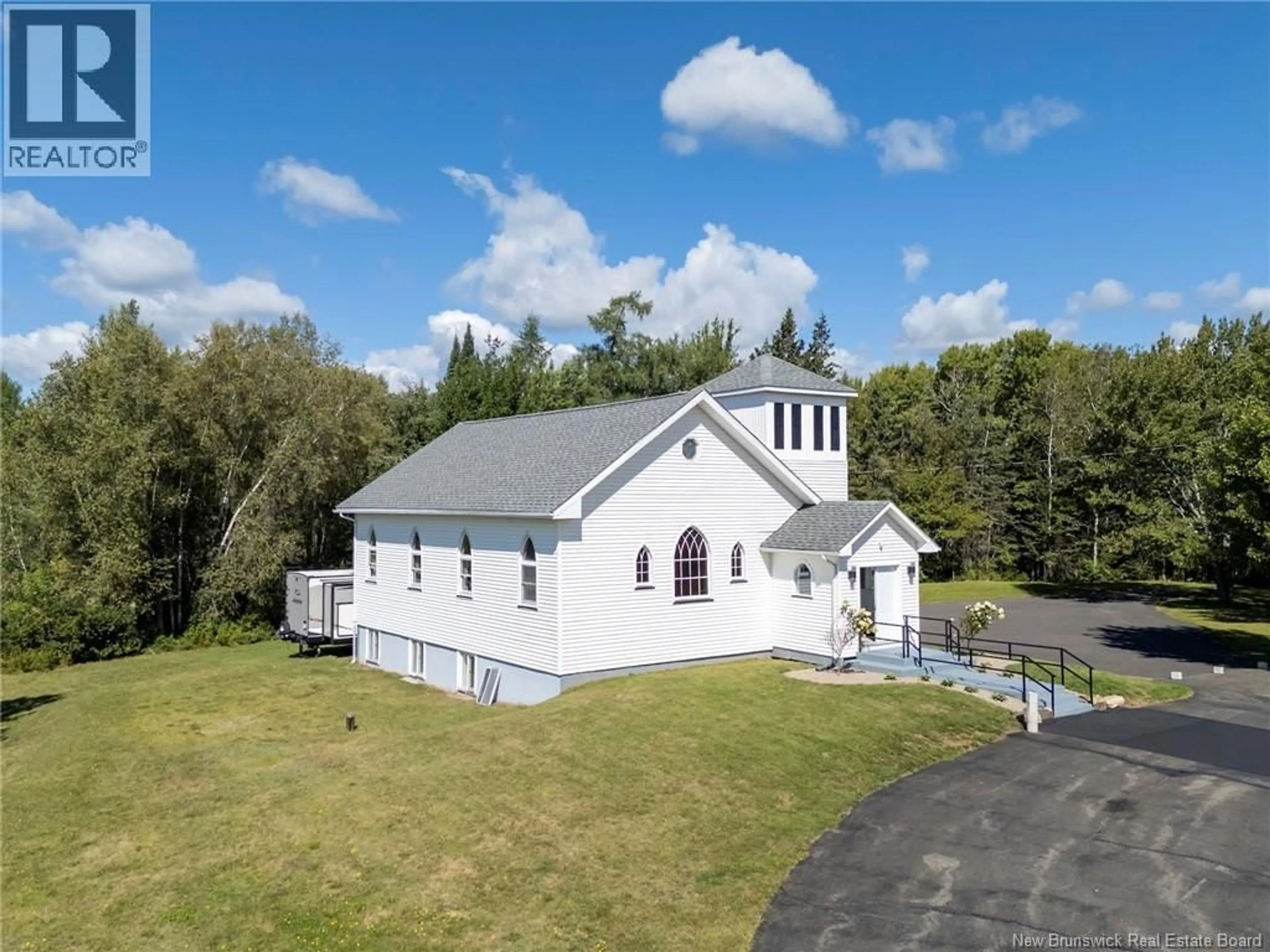 A pic from outside/outdoor area/front of a property/back of a property/a pic from drone, building for 700 MAIN STREET, Chipman New Brunswick E4A2R5
