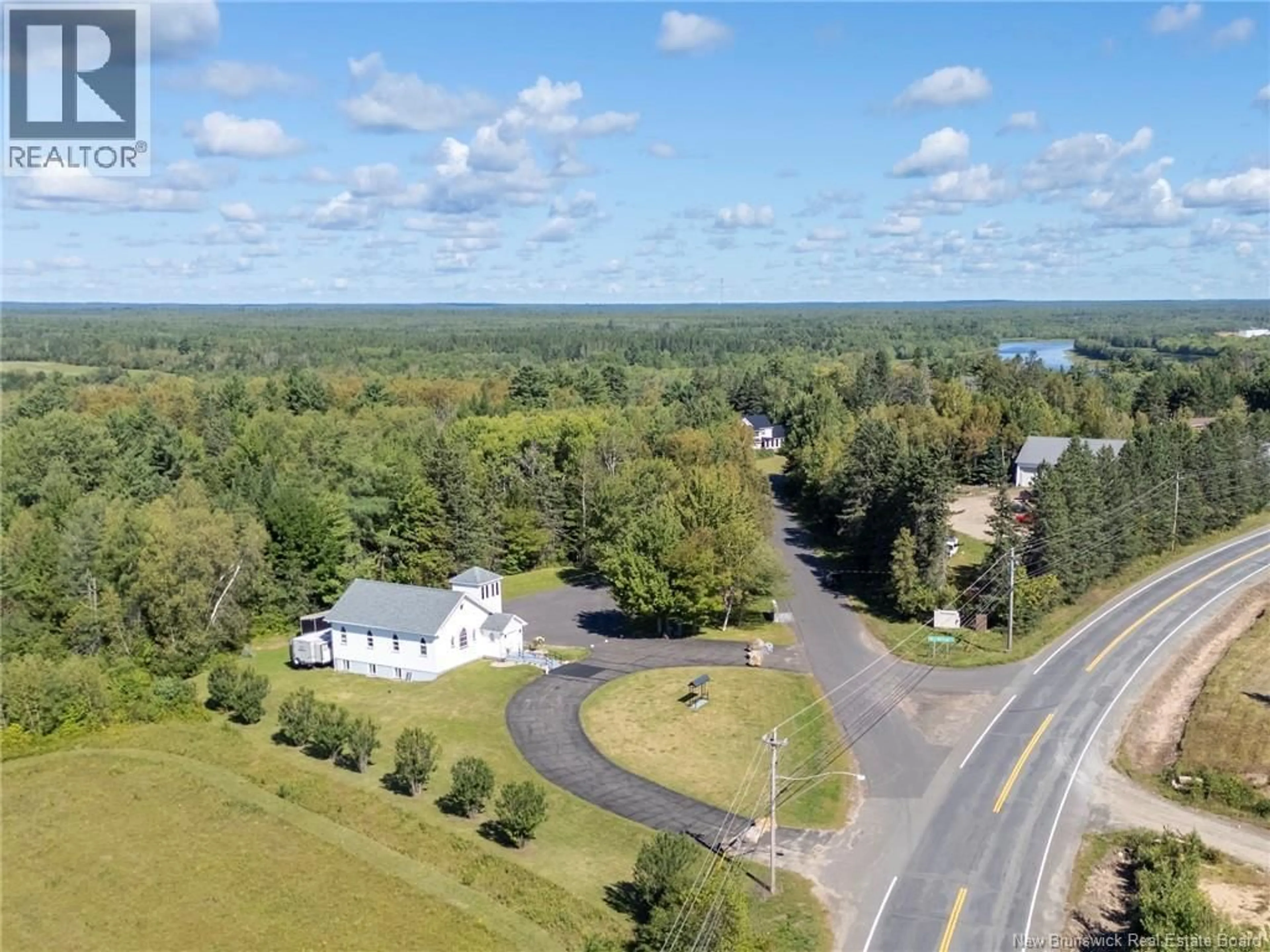 A pic from outside/outdoor area/front of a property/back of a property/a pic from drone, water/lake/river/ocean view for 700 MAIN STREET, Chipman New Brunswick E4A2R5