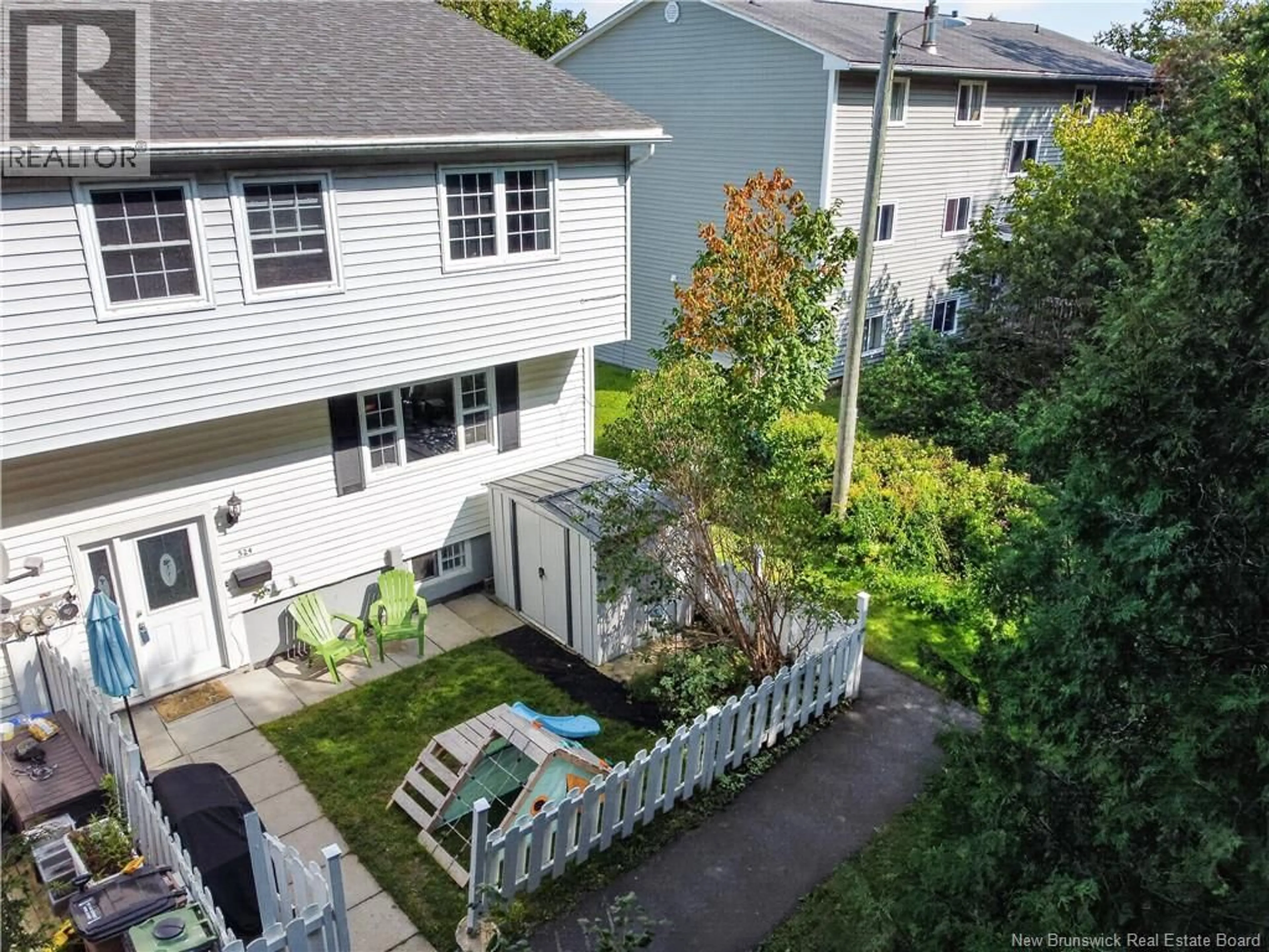 A pic from outside/outdoor area/front of a property/back of a property/a pic from drone, street for 524 TARTAN STREET, Saint John New Brunswick E2K2R7