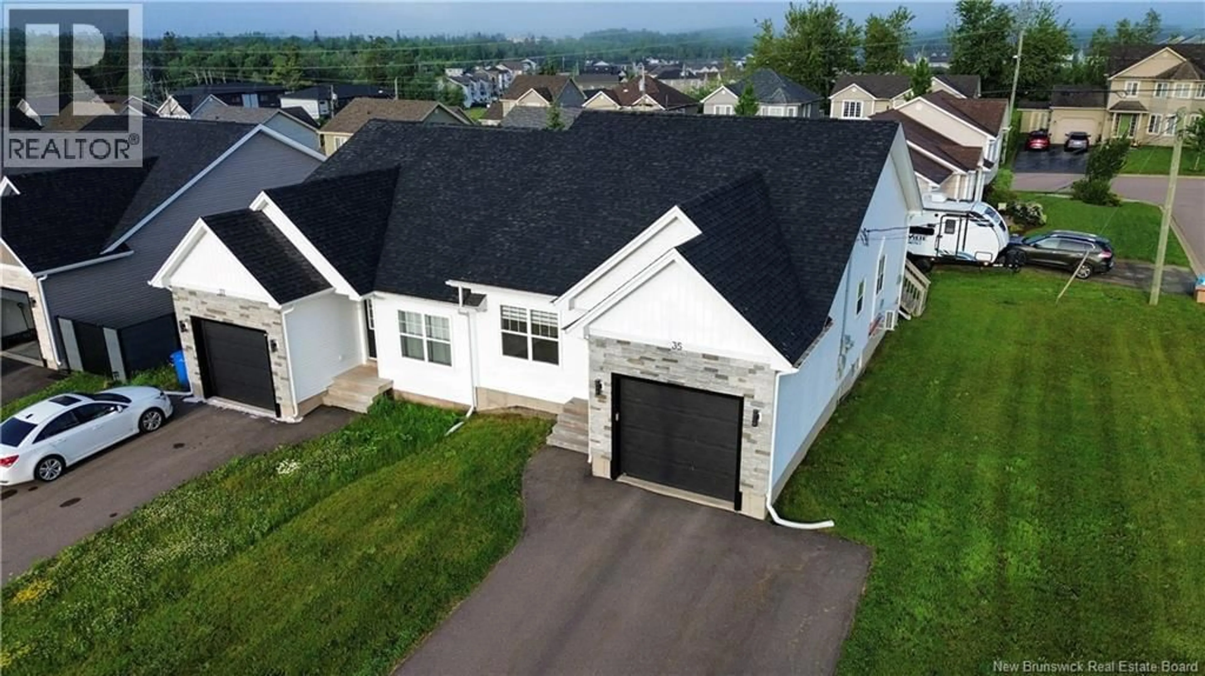 A pic from outside/outdoor area/front of a property/back of a property/a pic from drone, unknown for 35 ANASTASIA CRESCENT, Moncton New Brunswick E1E0E4