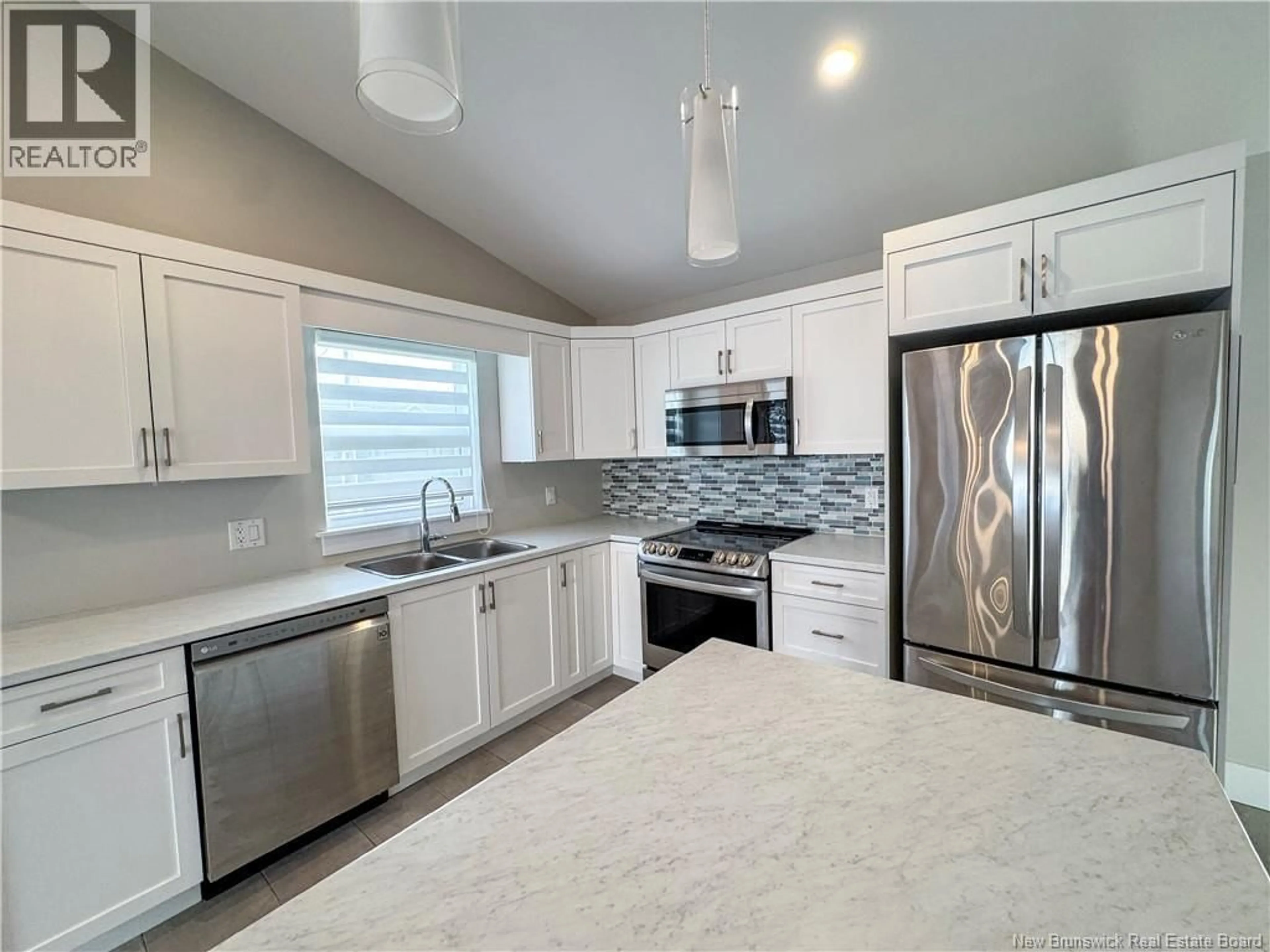 Open concept kitchen, ceramic/tile floor for 35 ANASTASIA CRESCENT, Moncton New Brunswick E1E0E4