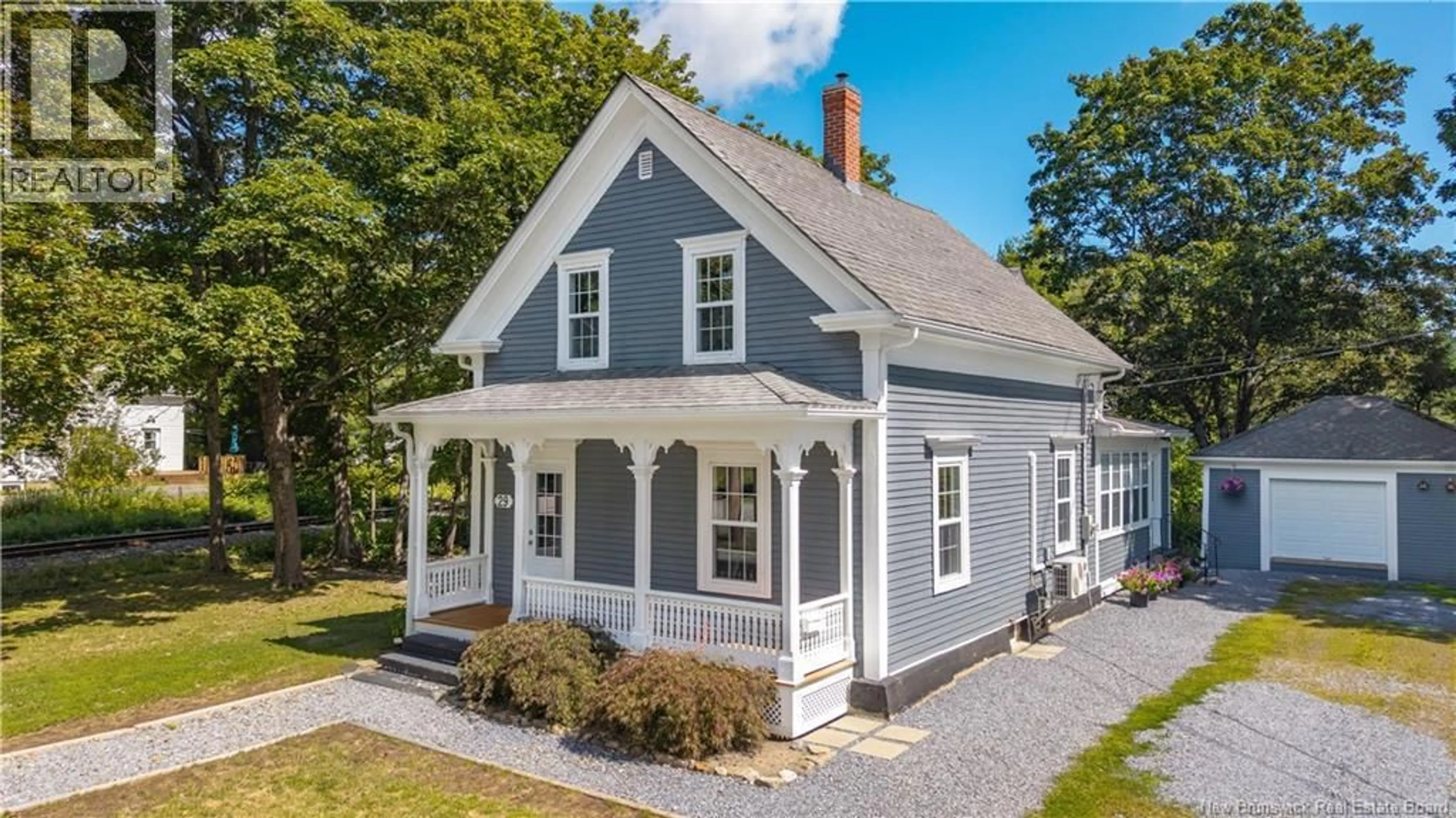 Home with vinyl exterior material, street for 29 ELM STREET, St. Stephen New Brunswick E3L2S5
