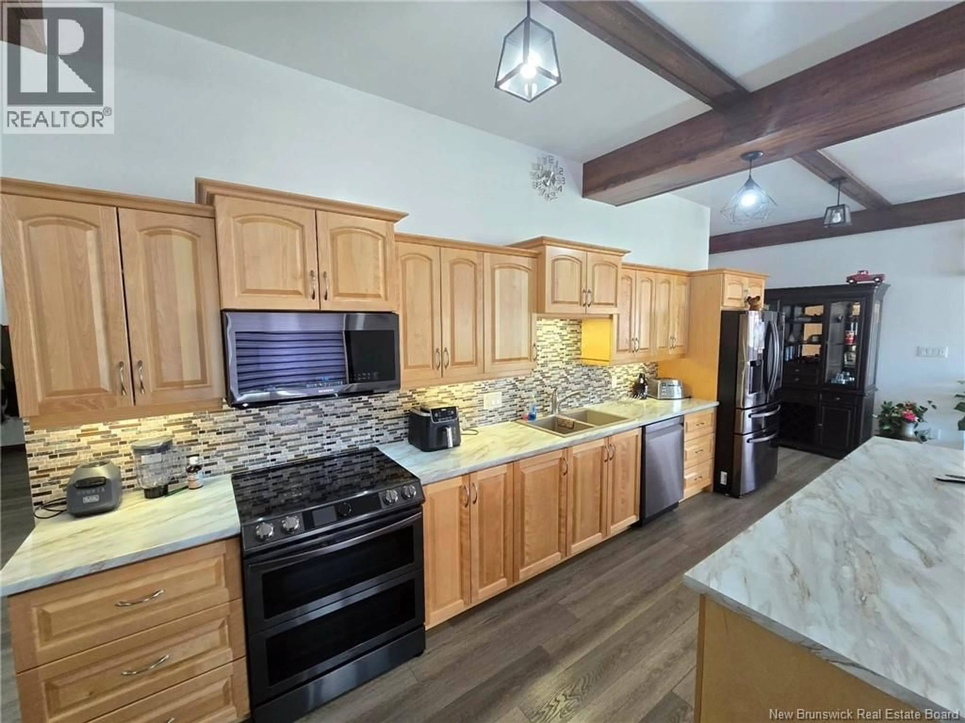Open concept kitchen, ceramic/tile floor for 959 PRINCIPALE, Beresford New Brunswick E2A1M7
