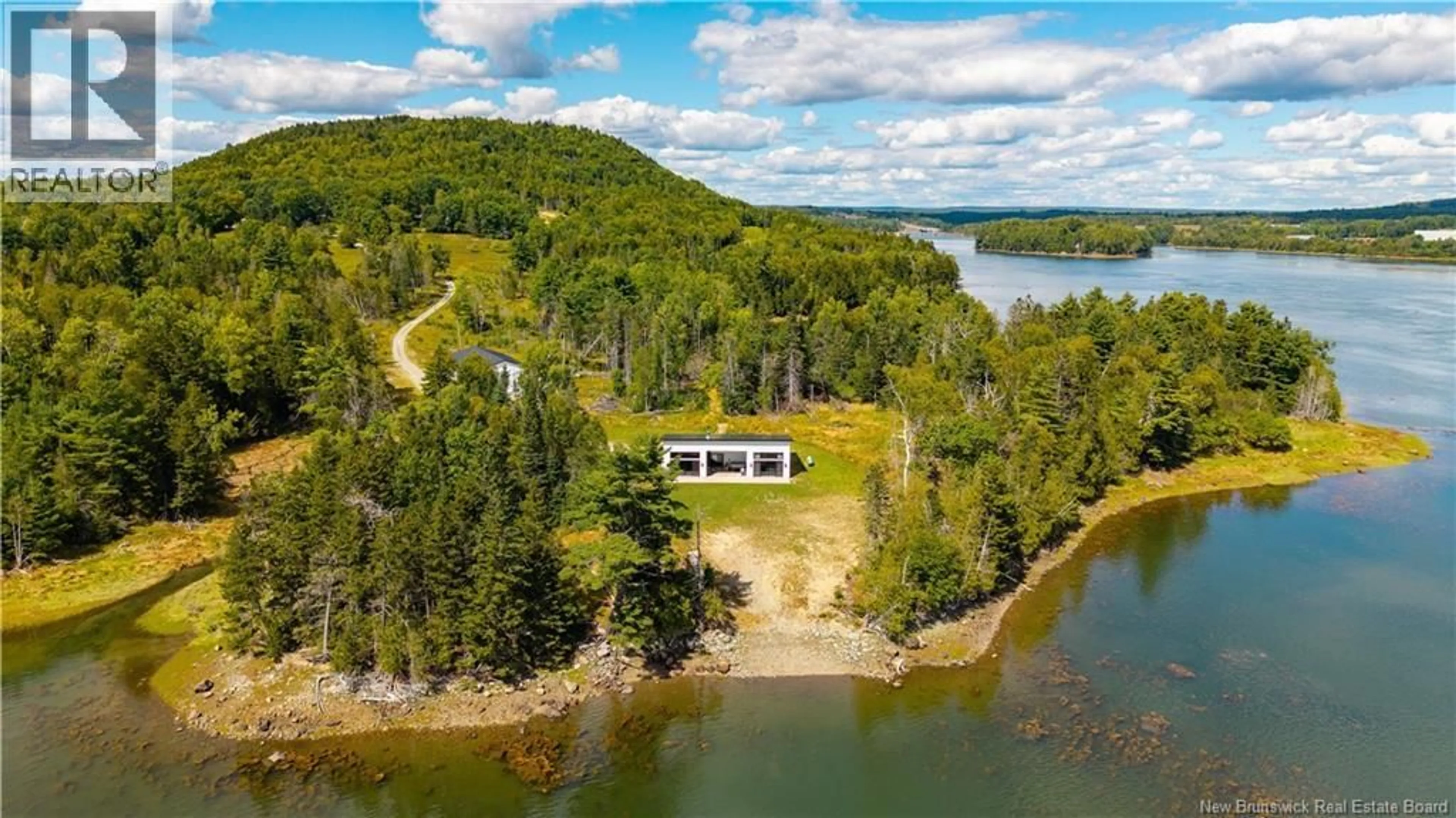 A pic from outside/outdoor area/front of a property/back of a property/a pic from drone, water/lake/river/ocean view for 40 HILLS ROAD, Oak Bay New Brunswick E3L4K6