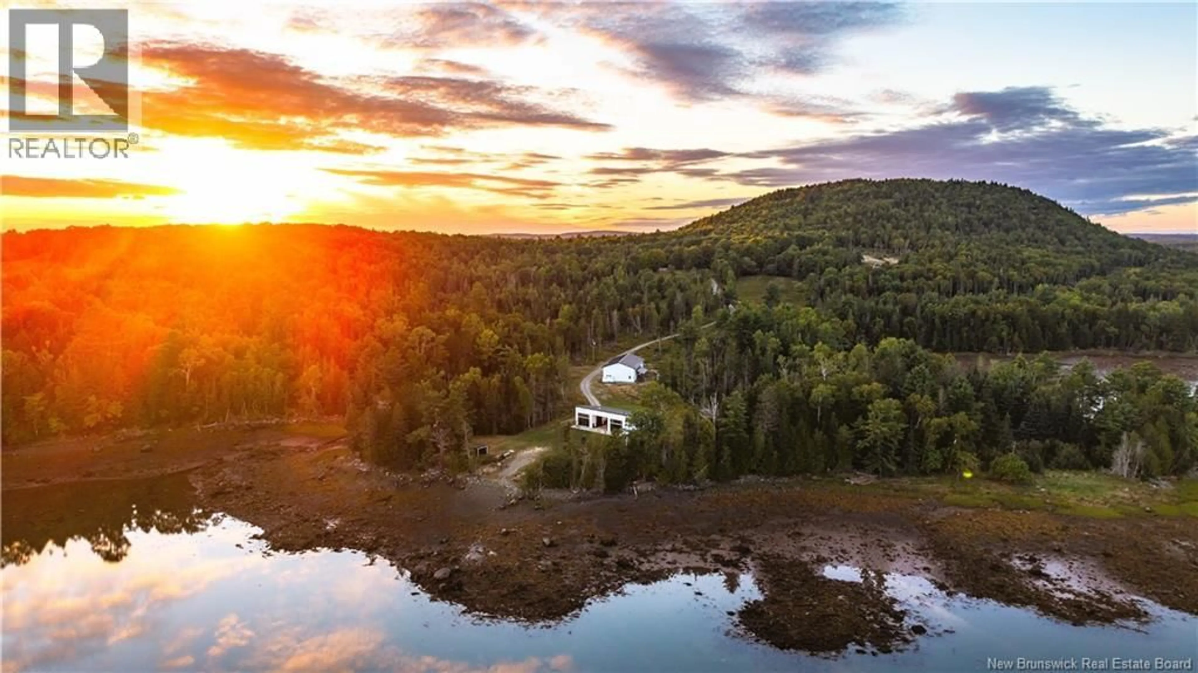 A pic from outside/outdoor area/front of a property/back of a property/a pic from drone, water/lake/river/ocean view for 40 HILLS ROAD, Oak Bay New Brunswick E3L4K6