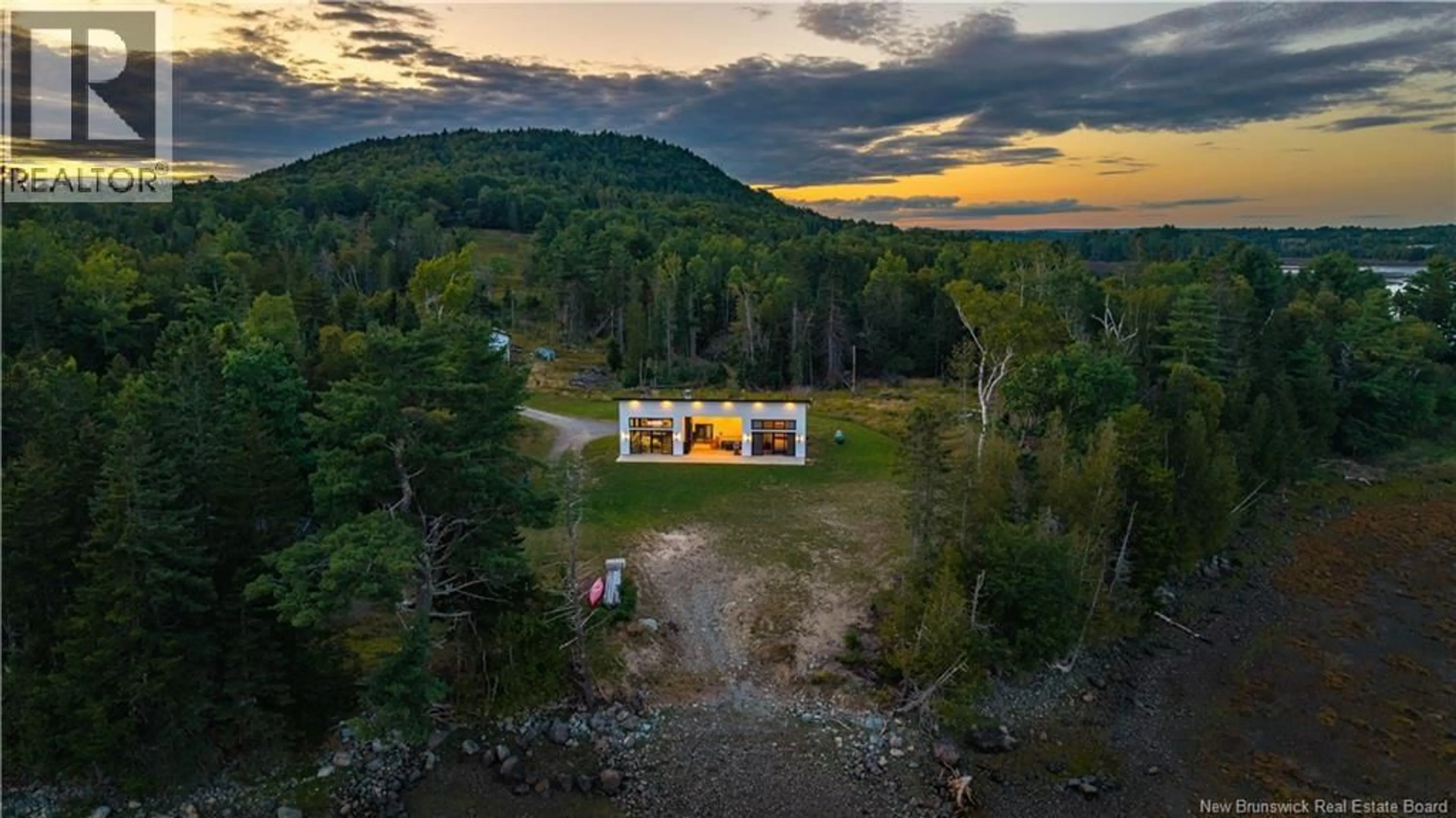 A pic from outside/outdoor area/front of a property/back of a property/a pic from drone, water/lake/river/ocean view for 40 HILLS ROAD, Oak Bay New Brunswick E3L4K6
