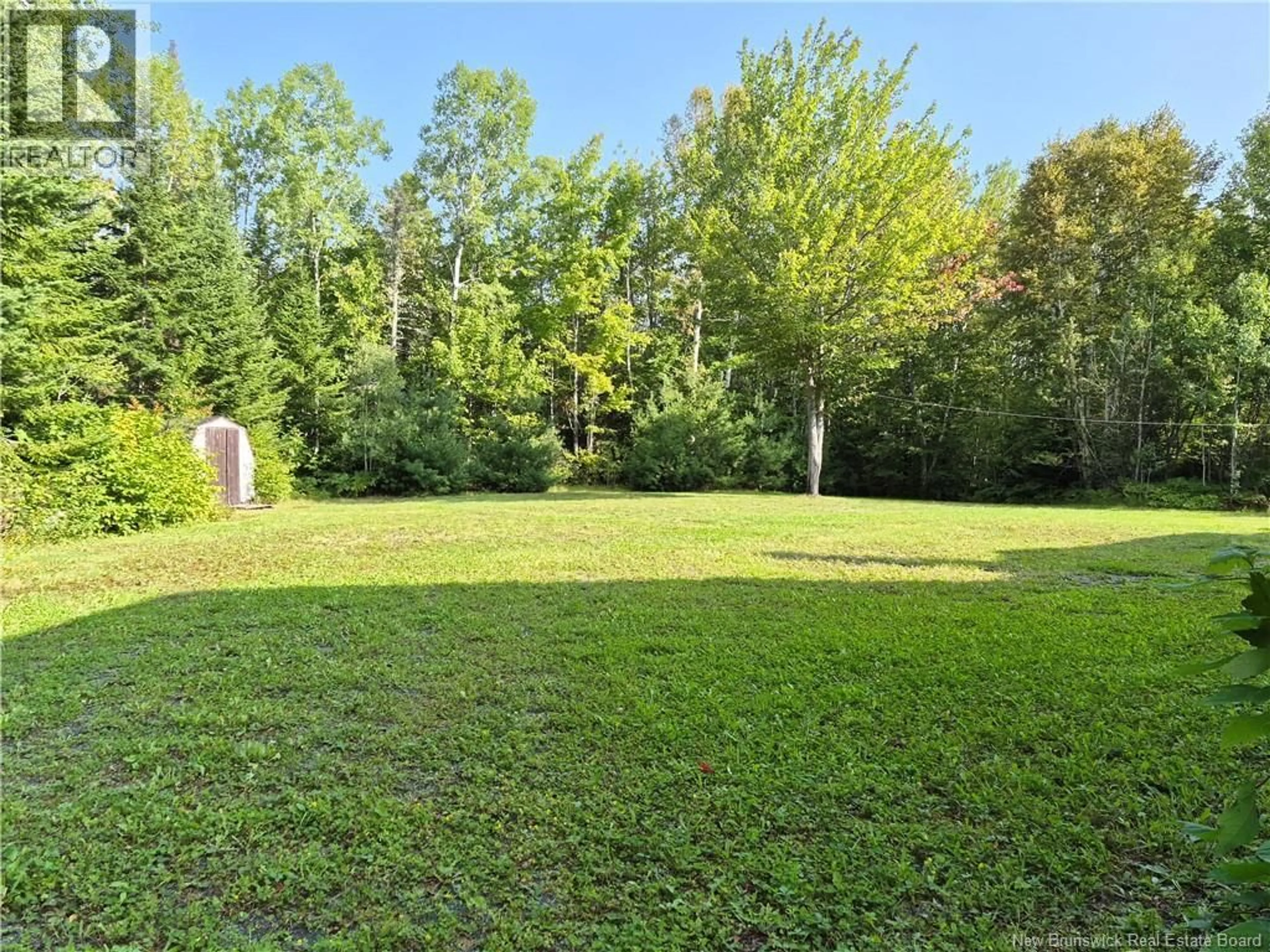 A pic from outside/outdoor area/front of a property/back of a property/a pic from drone, forest/trees view for 120 RUE FRENETTE, Nigadoo New Brunswick E8K3V7