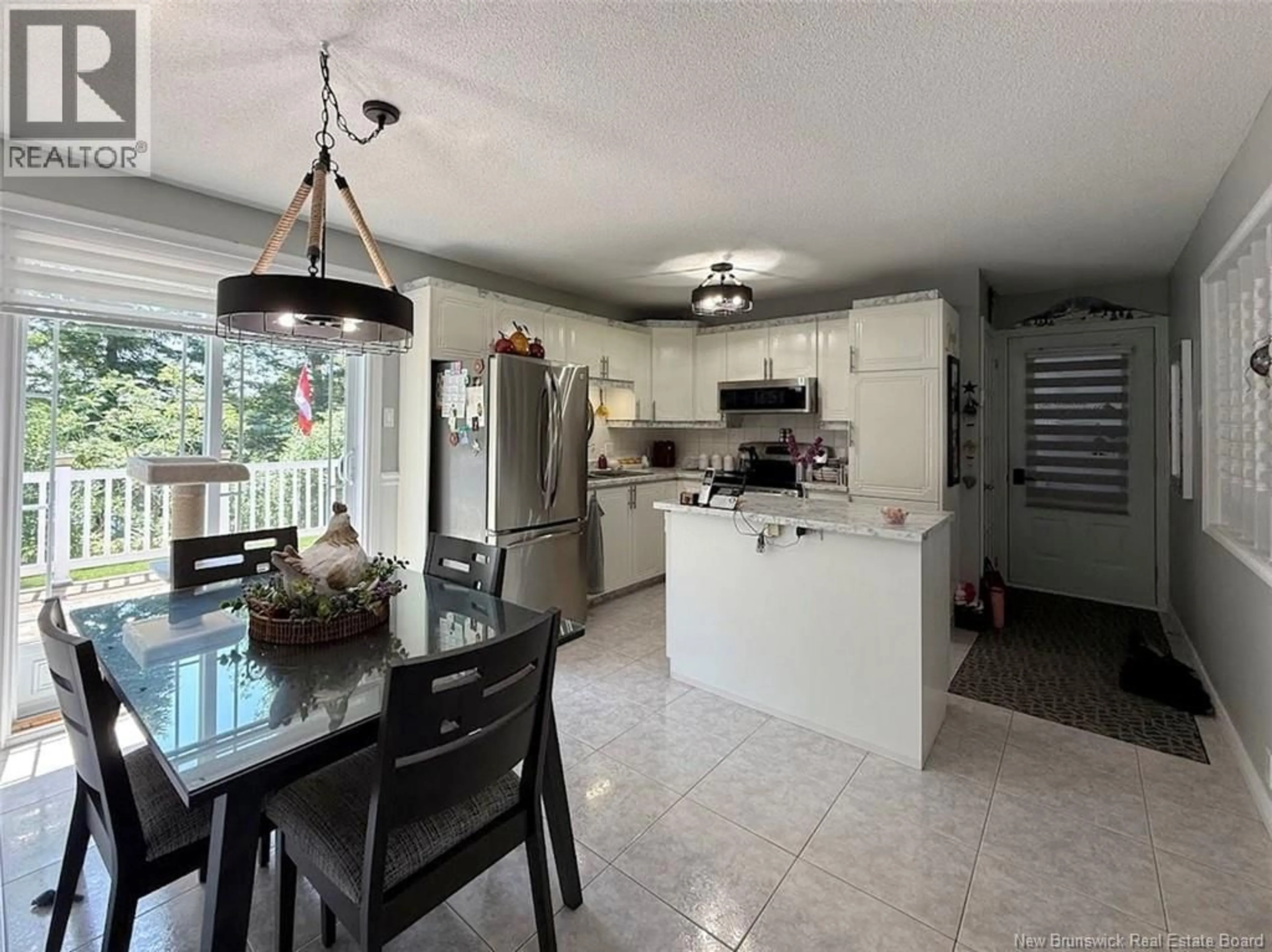 Open concept kitchen, ceramic/tile floor for 20 COMMERCIALE STREET, Saint-Jacques New Brunswick E7B1C9