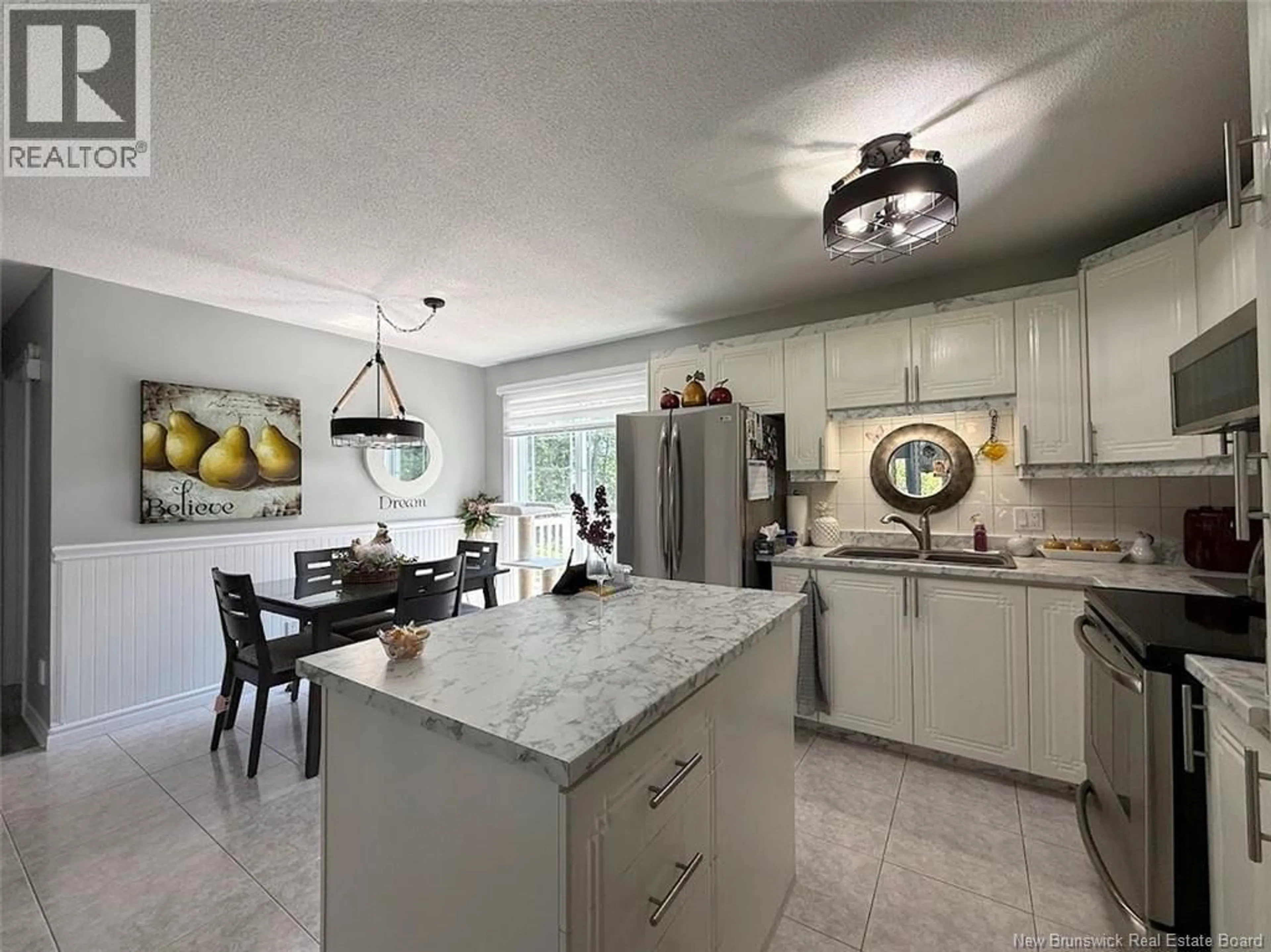 Open concept kitchen, ceramic/tile floor for 20 COMMERCIALE STREET, Saint-Jacques New Brunswick E7B1C9