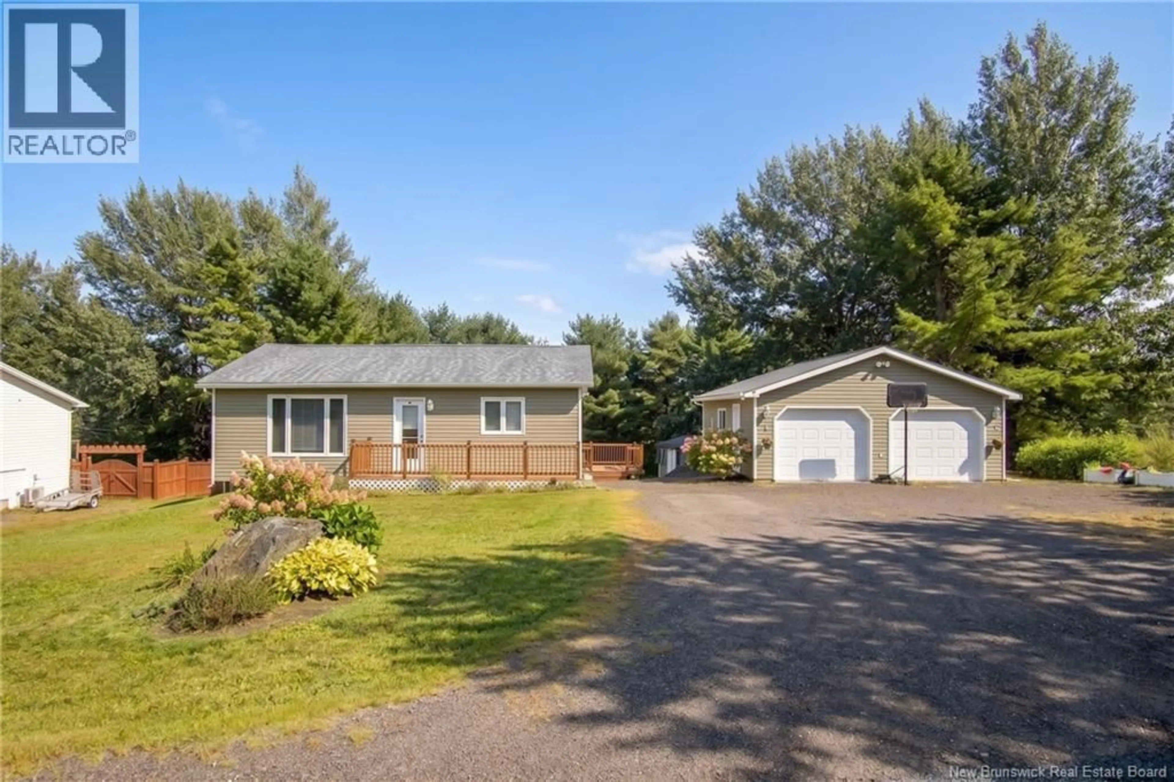 A pic from outside/outdoor area/front of a property/back of a property/a pic from drone, street for 21 SUNNYSIDE DRIVE, Grand Bay-Westfield New Brunswick E5K3M5