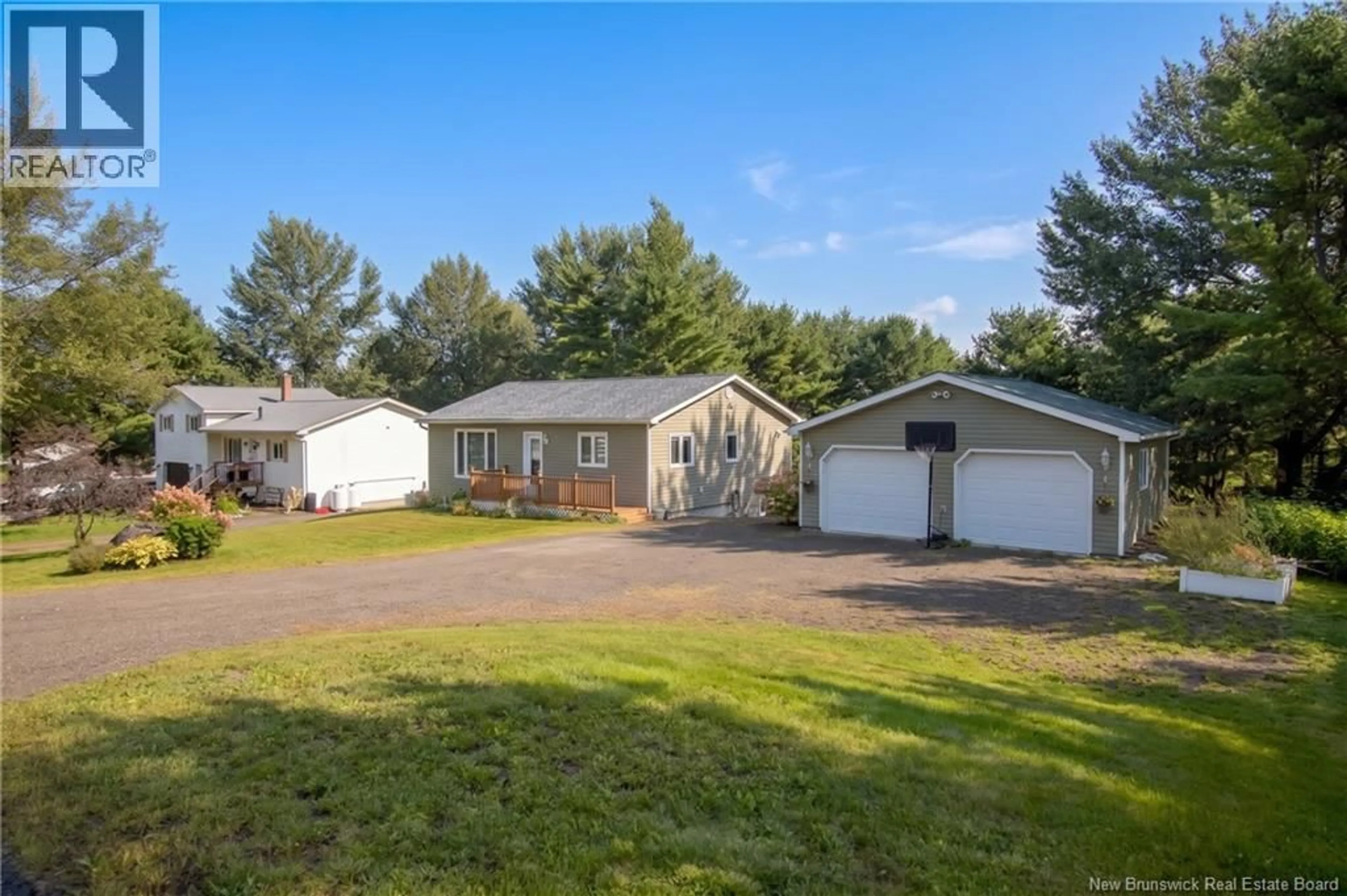 A pic from outside/outdoor area/front of a property/back of a property/a pic from drone, water/lake/river/ocean view for 21 SUNNYSIDE DRIVE, Grand Bay-Westfield New Brunswick E5K3M5