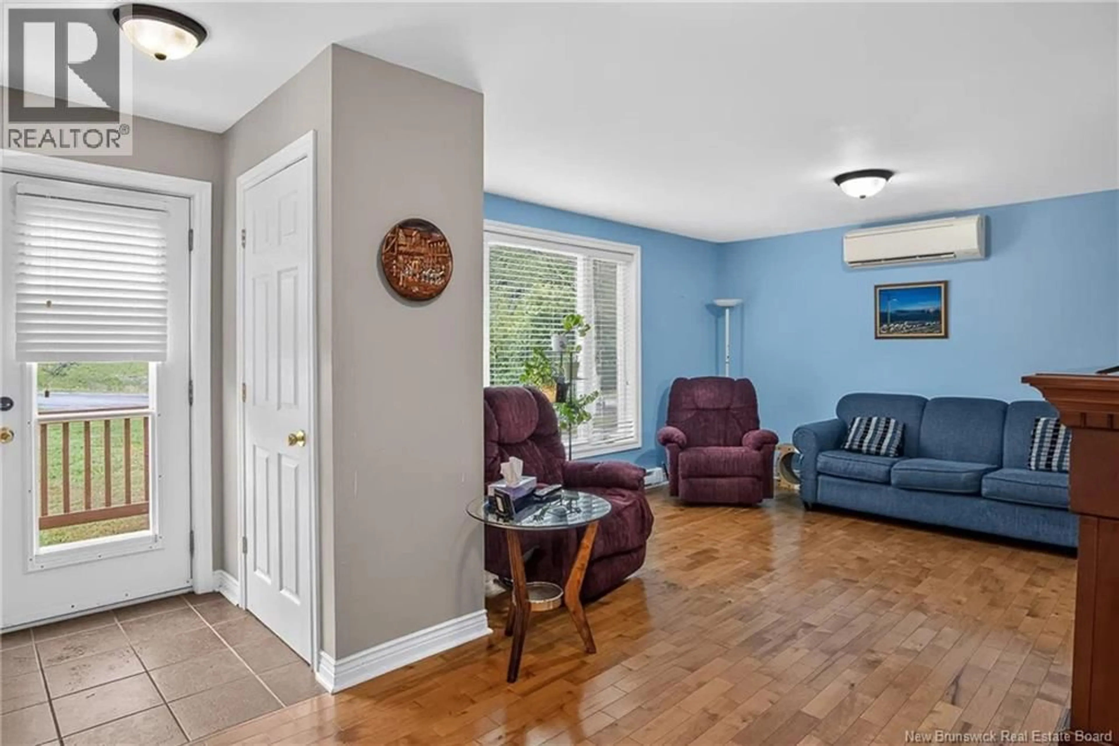 Living room with furniture, unknown for 21 SUNNYSIDE DRIVE, Grand Bay-Westfield New Brunswick E5K3M5