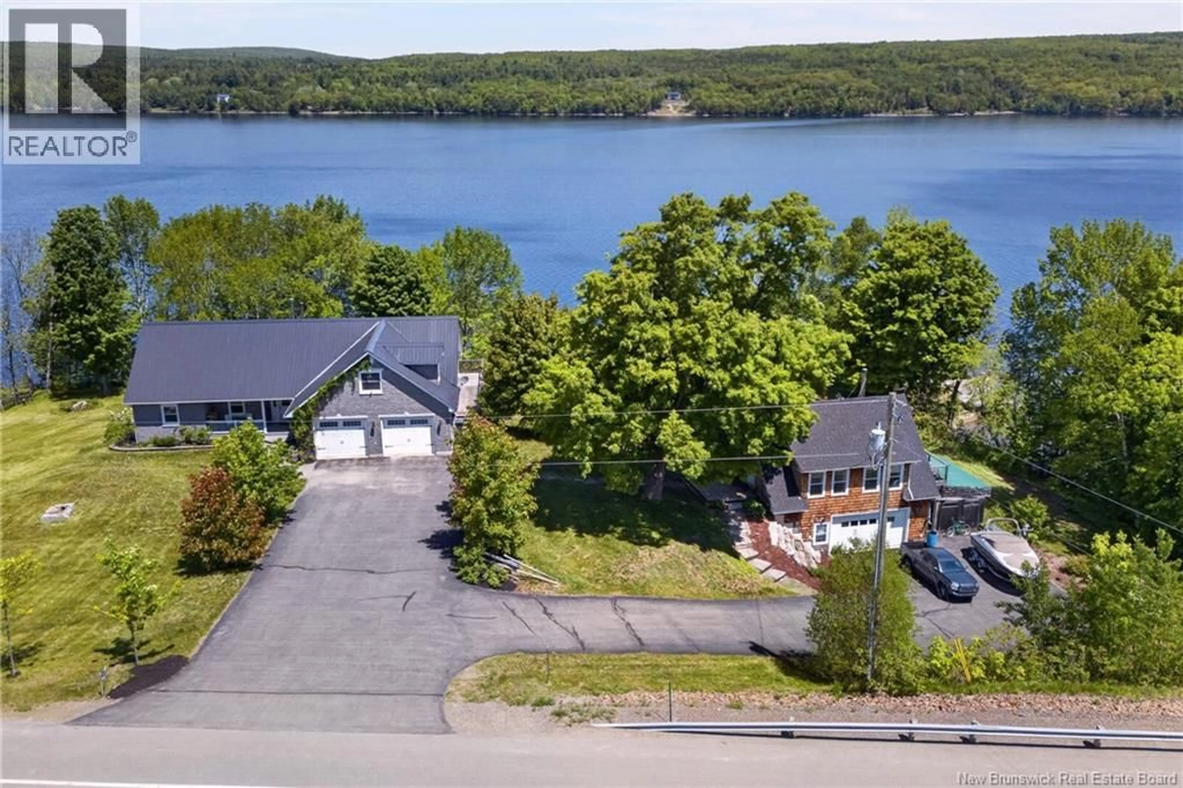 A pic from outside/outdoor area/front of a property/back of a property/a pic from drone, water/lake/river/ocean view for 7343 ROUTE 102, Dumfries New Brunswick E6G1P6