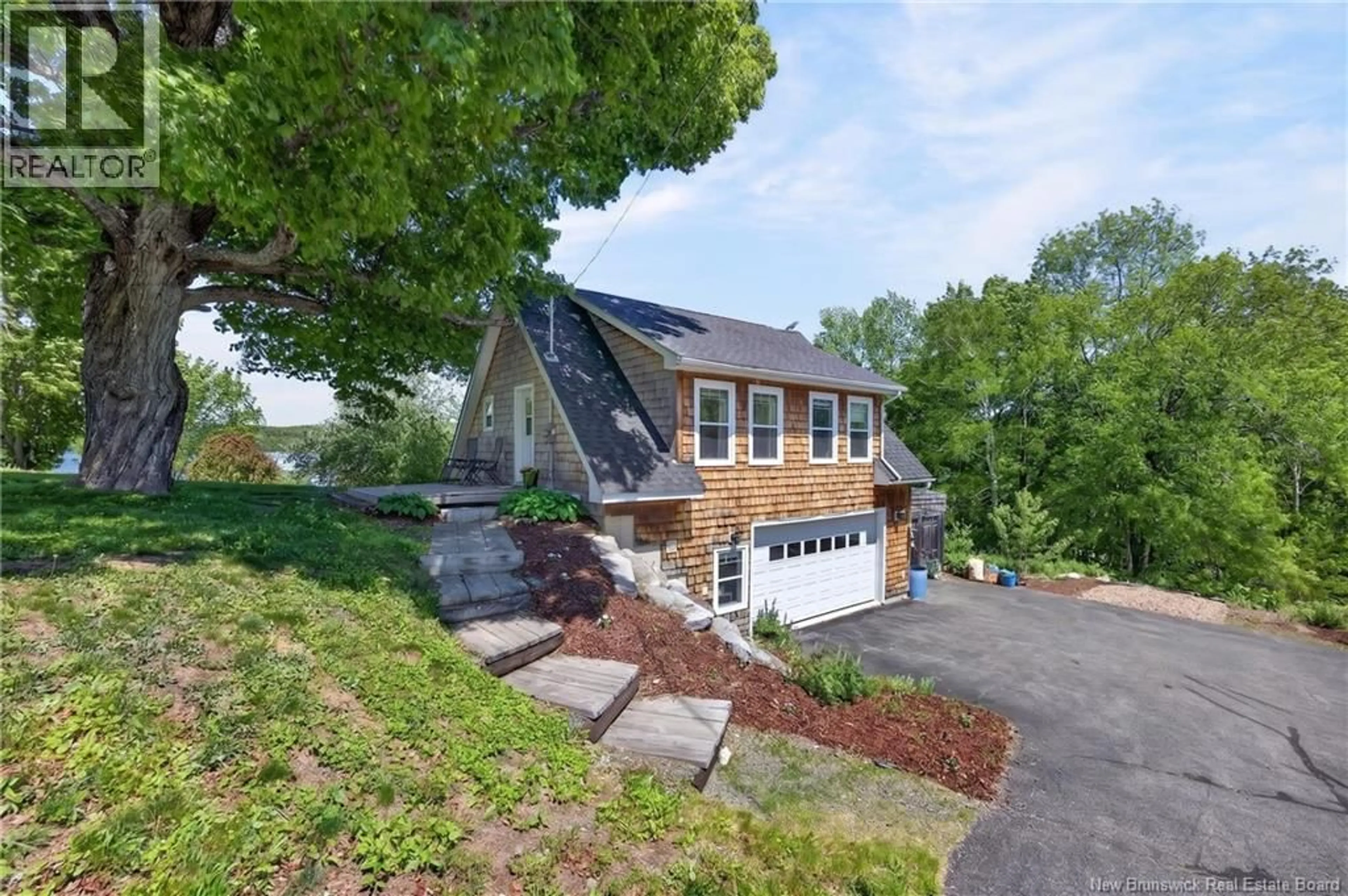 Home with vinyl exterior material, street for 7343 ROUTE 102, Dumfries New Brunswick E6G1P6