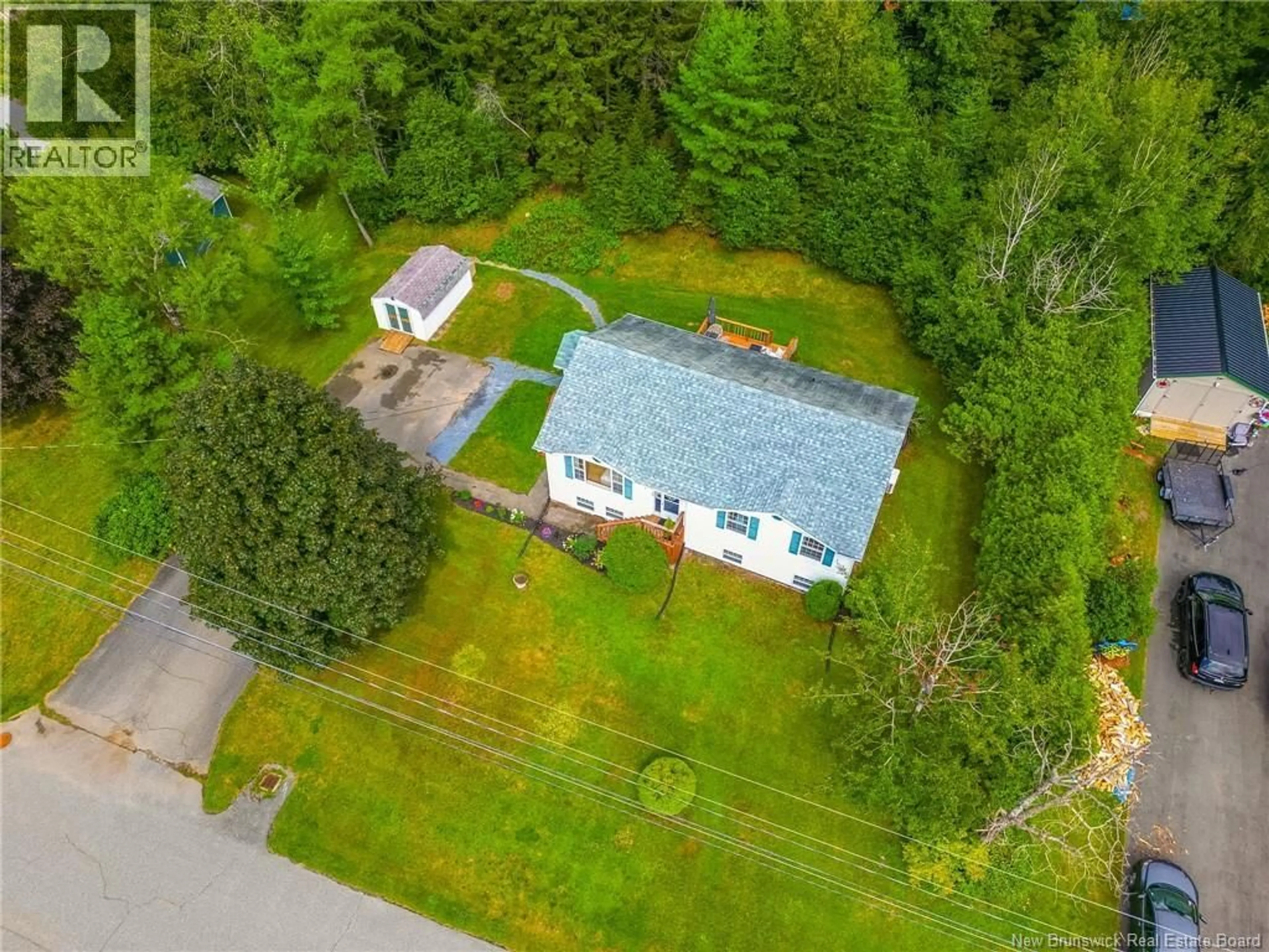 A pic from outside/outdoor area/front of a property/back of a property/a pic from drone, street for 10 MEADOW BROOK DRIVE, Grand Bay-Westfield New Brunswick E5K2S8