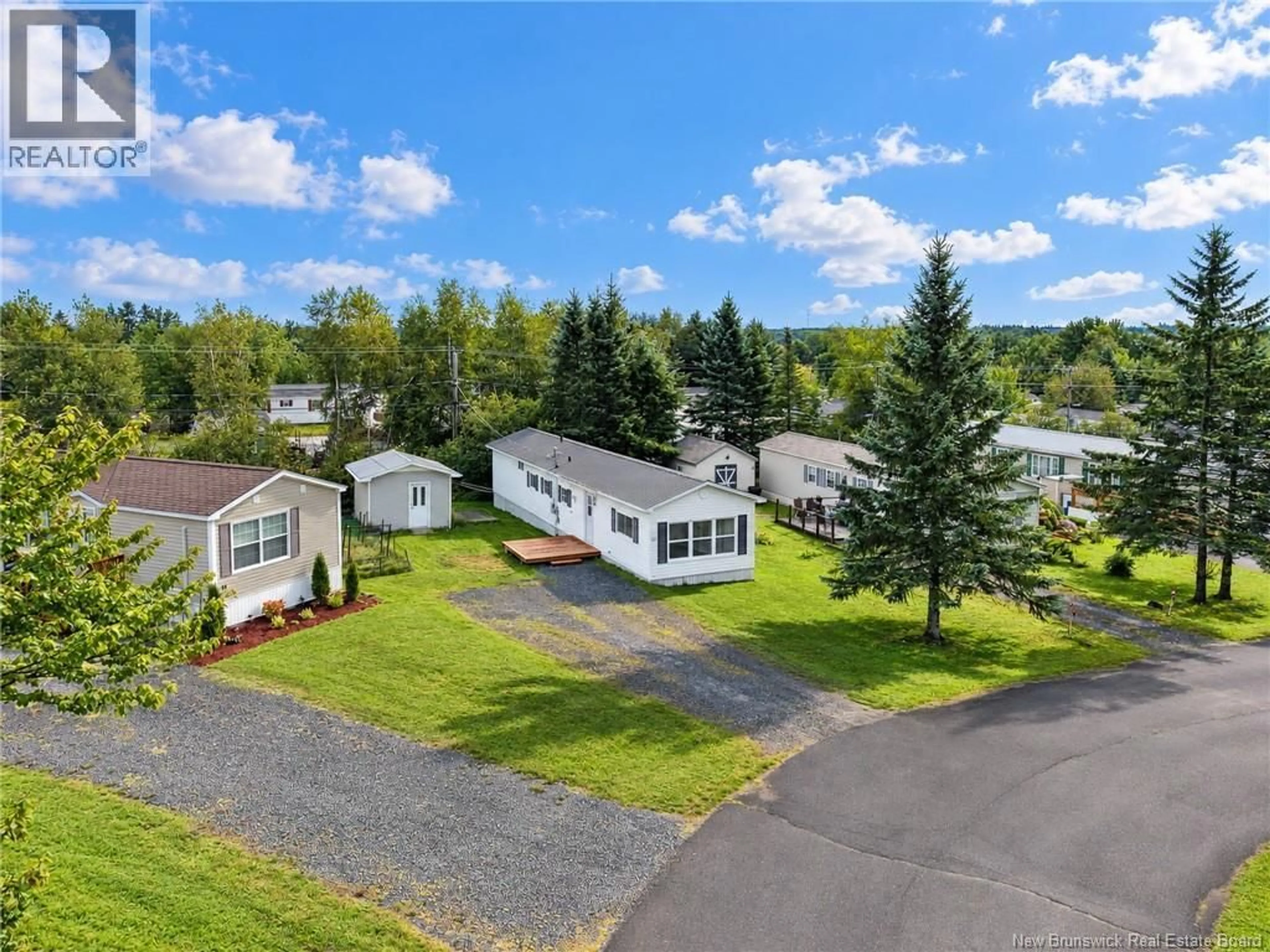 A pic from outside/outdoor area/front of a property/back of a property/a pic from drone, mountain view for 14 ELMDALE CRESCENT, Fredericton New Brunswick E3B6P9