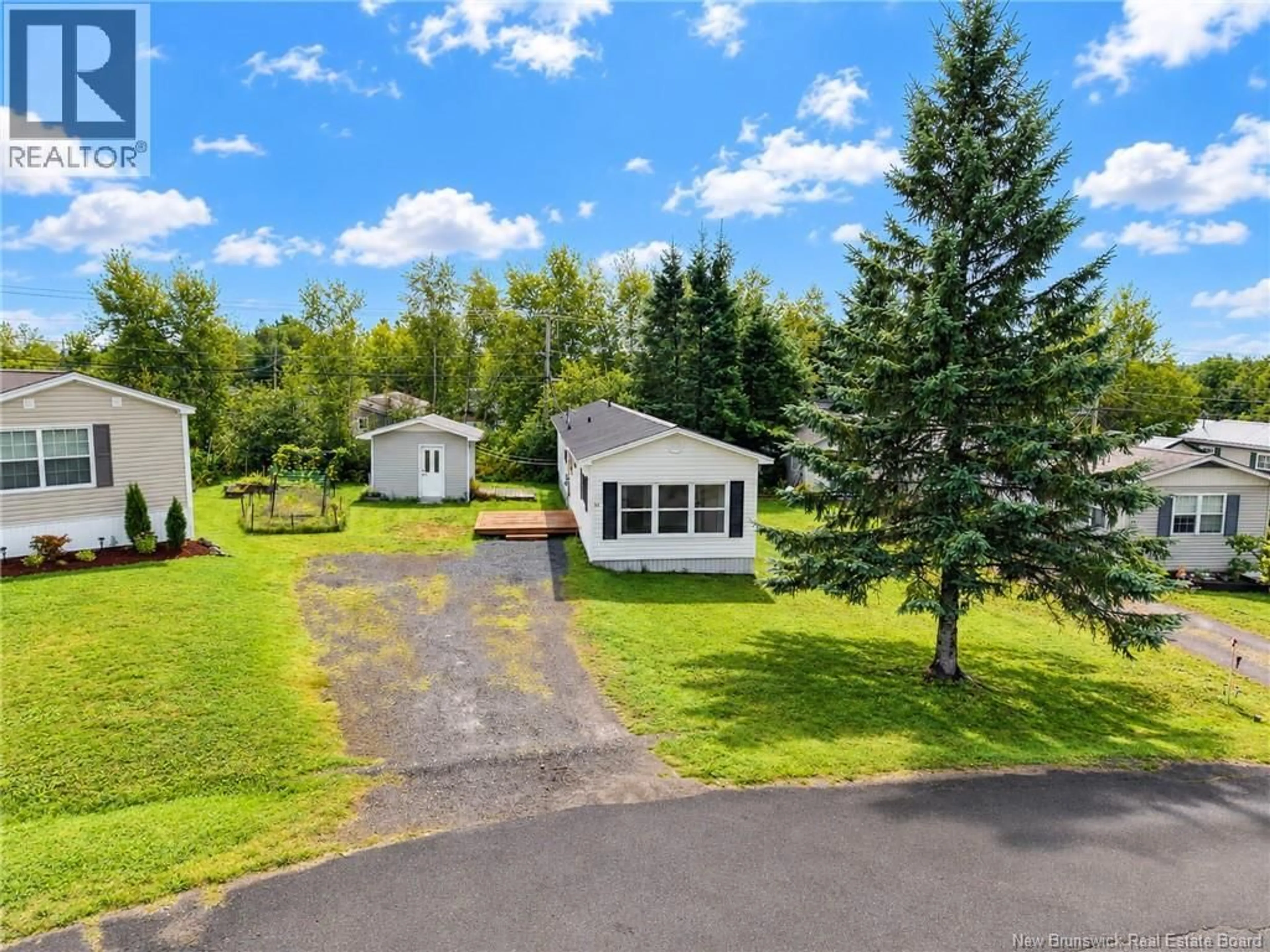 A pic from outside/outdoor area/front of a property/back of a property/a pic from drone, water/lake/river/ocean view for 14 ELMDALE CRESCENT, Fredericton New Brunswick E3B6P9