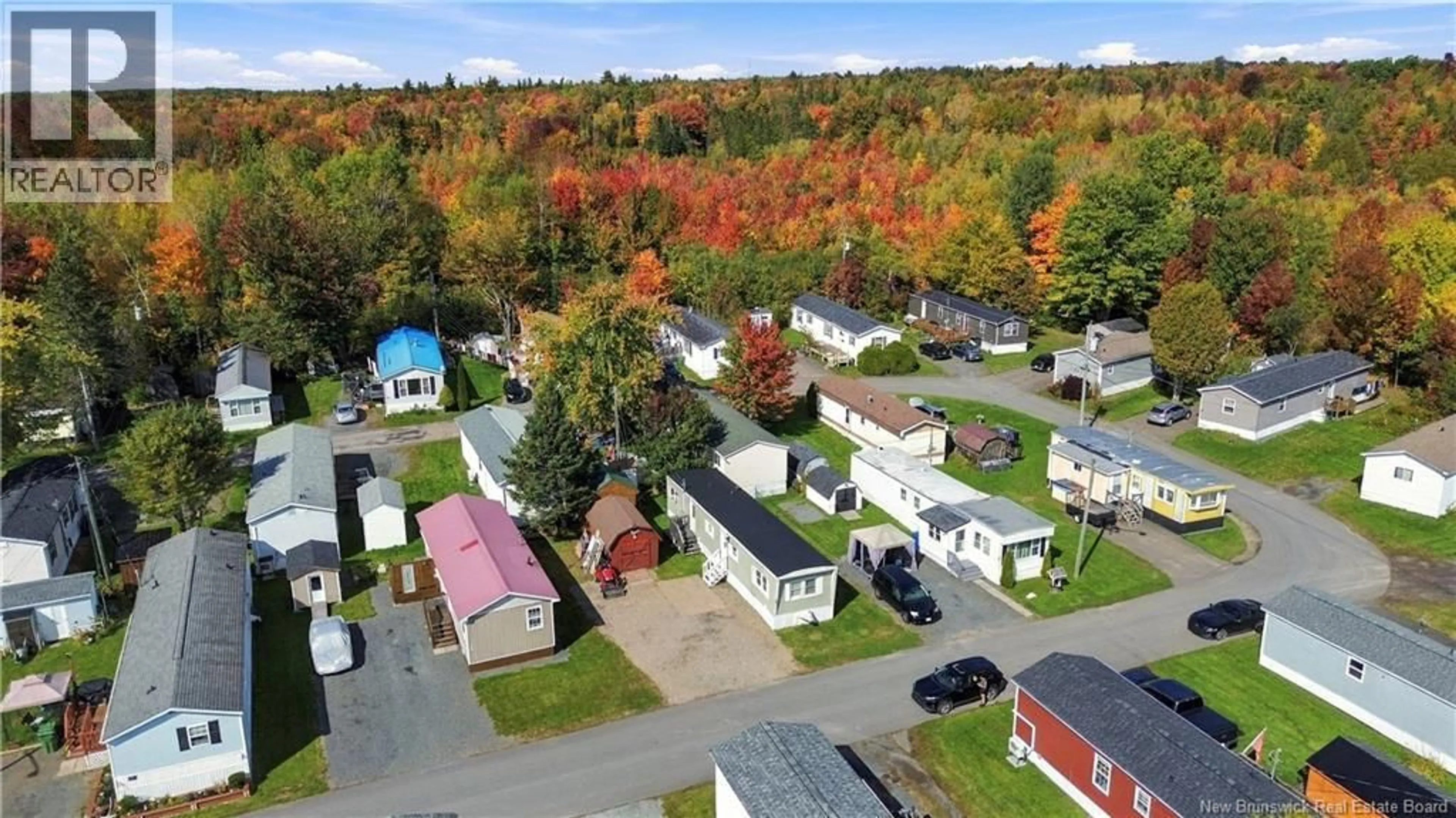 A pic from outside/outdoor area/front of a property/back of a property/a pic from drone, street for 23 DOUGLAS CRESCENT, New Maryland New Brunswick E3C1Y9