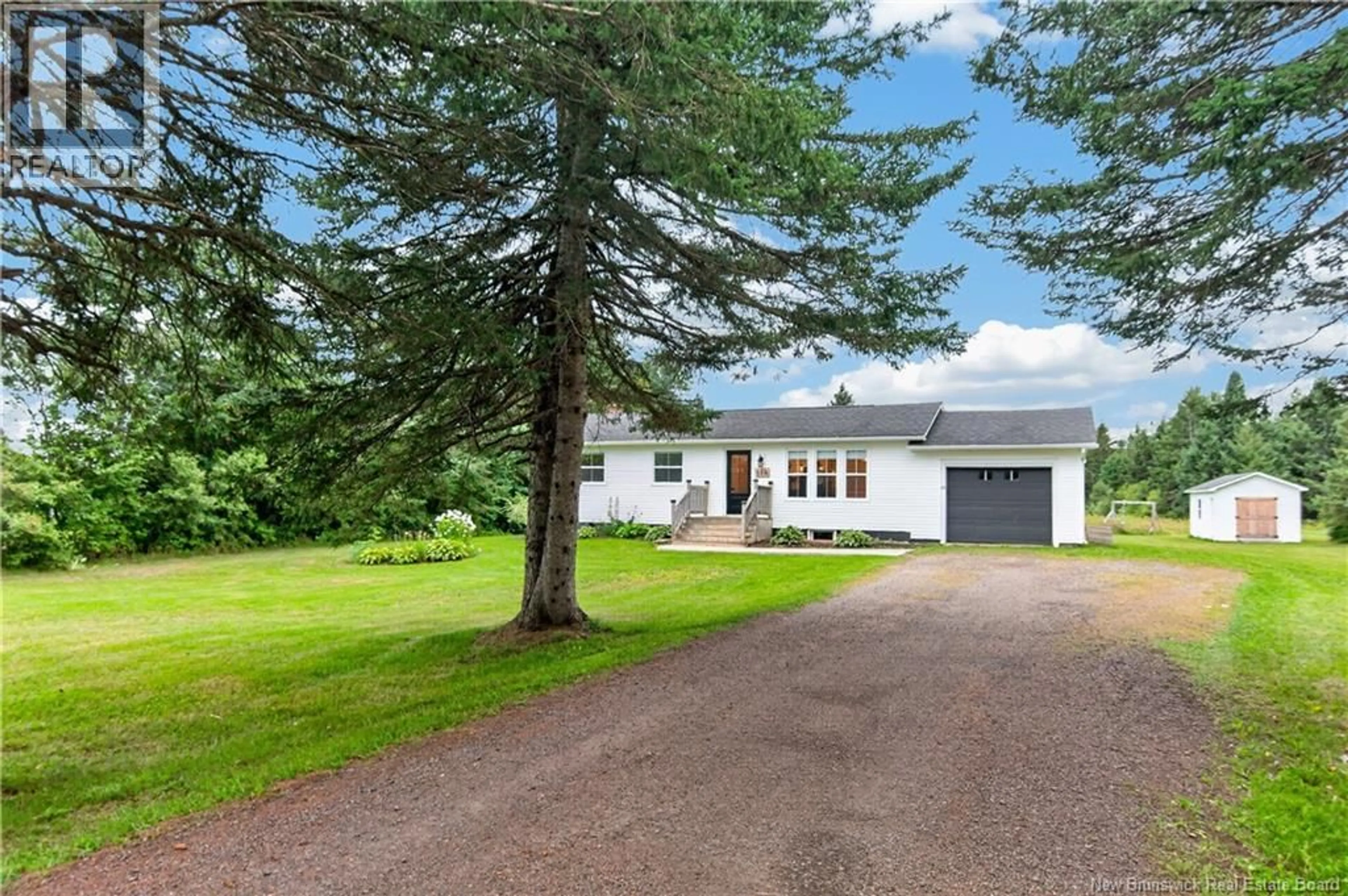 A pic from outside/outdoor area/front of a property/back of a property/a pic from drone, street for 118 GIROUARDVILLE STREET, Bouctouche New Brunswick E4S3G8