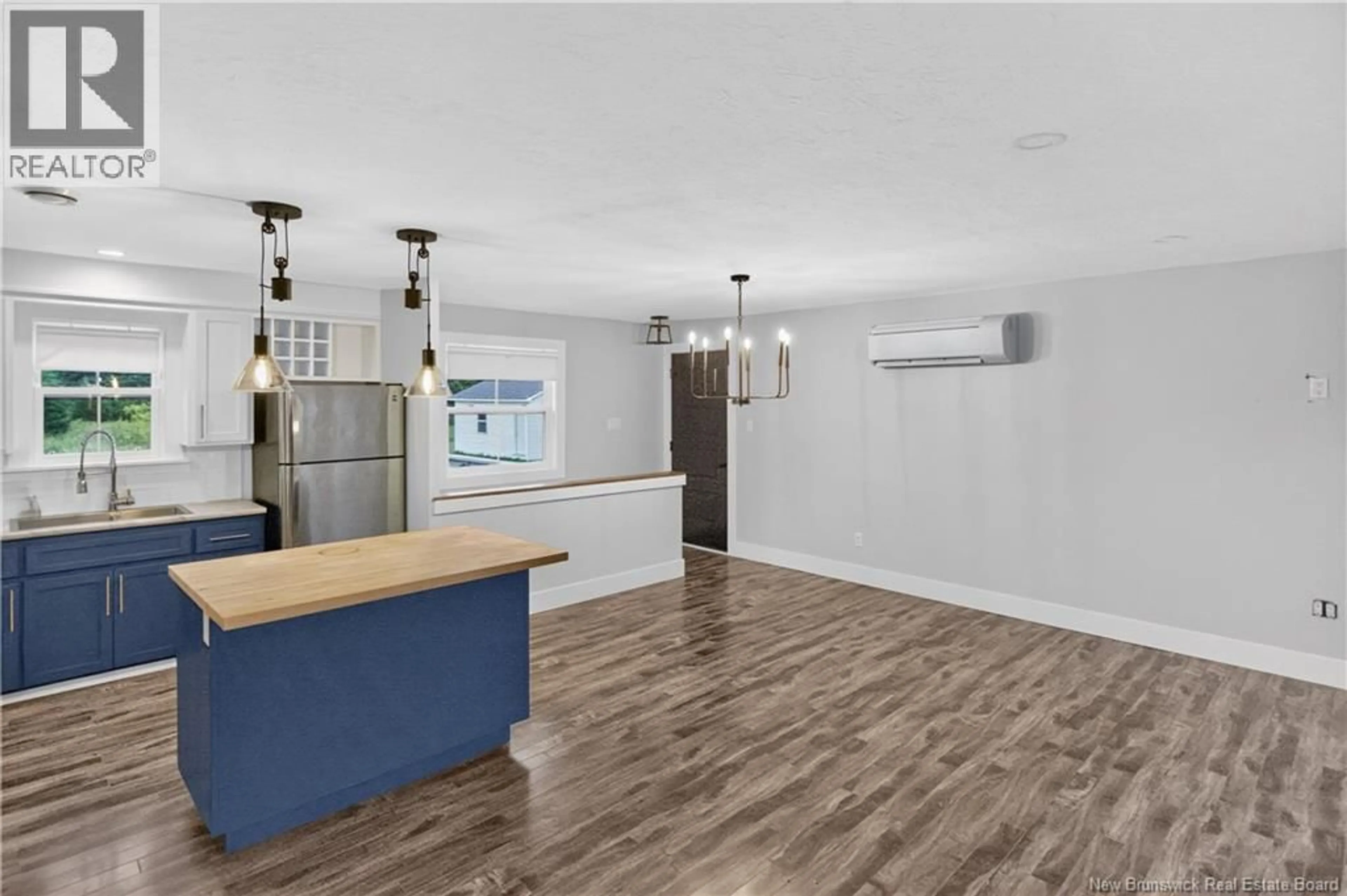 Open concept kitchen, wood/laminate floor for 118 GIROUARDVILLE STREET, Bouctouche New Brunswick E4S3G8