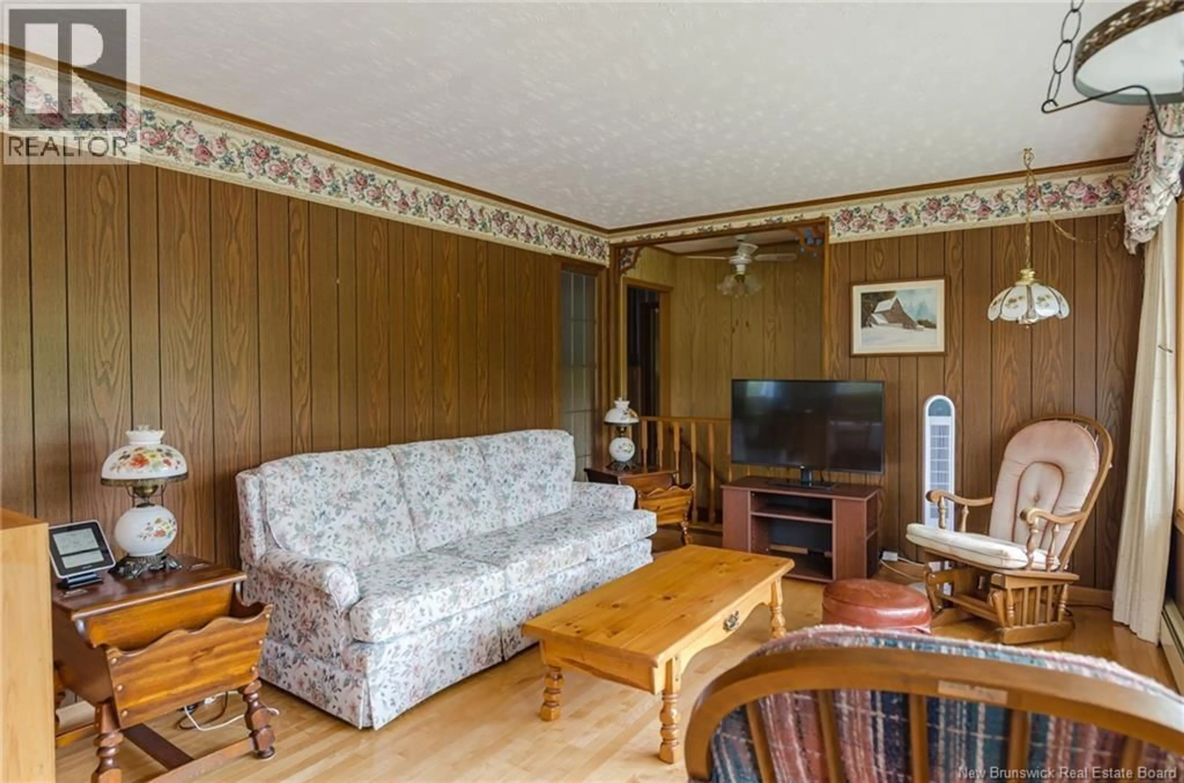 Living room with furniture, wood/laminate floor for 559 SANDY POINT ROAD, Saint John New Brunswick E2K3S1