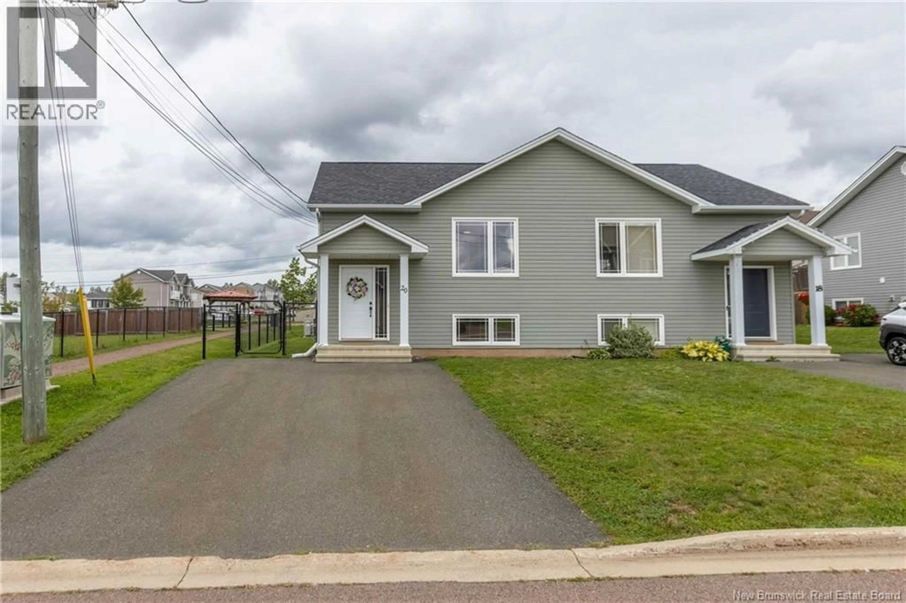 Home with vinyl exterior material, street for 20 EDINGTON STREET, Moncton New Brunswick E1E0G6