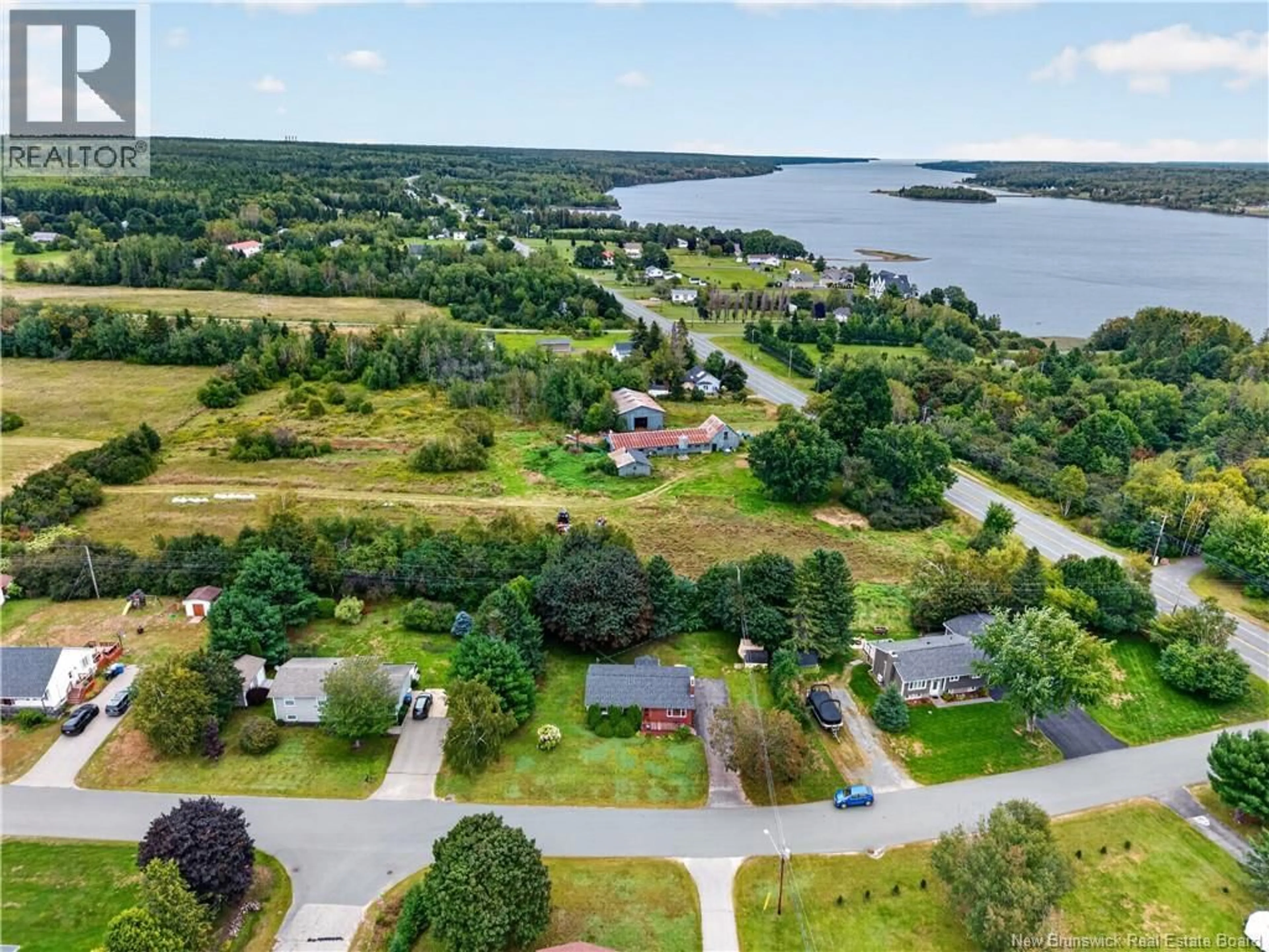 A pic from outside/outdoor area/front of a property/back of a property/a pic from drone, water/lake/river/ocean view for 3 CENTURY DRIVE, Miramichi New Brunswick E1V7A3