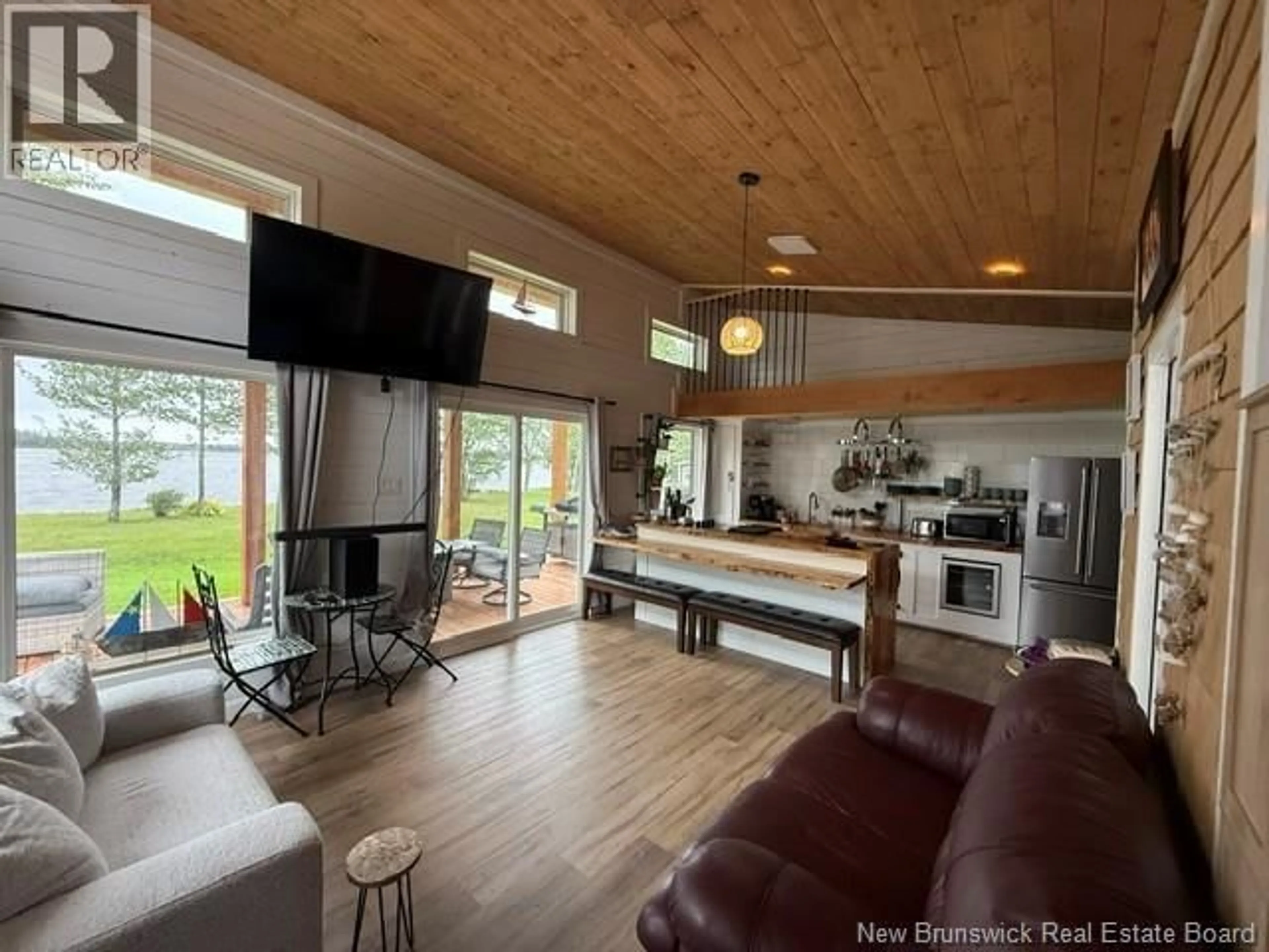Open concept kitchen, wood/laminate floor for 128 SANDY POINT, Landry Office New Brunswick E8P2L4
