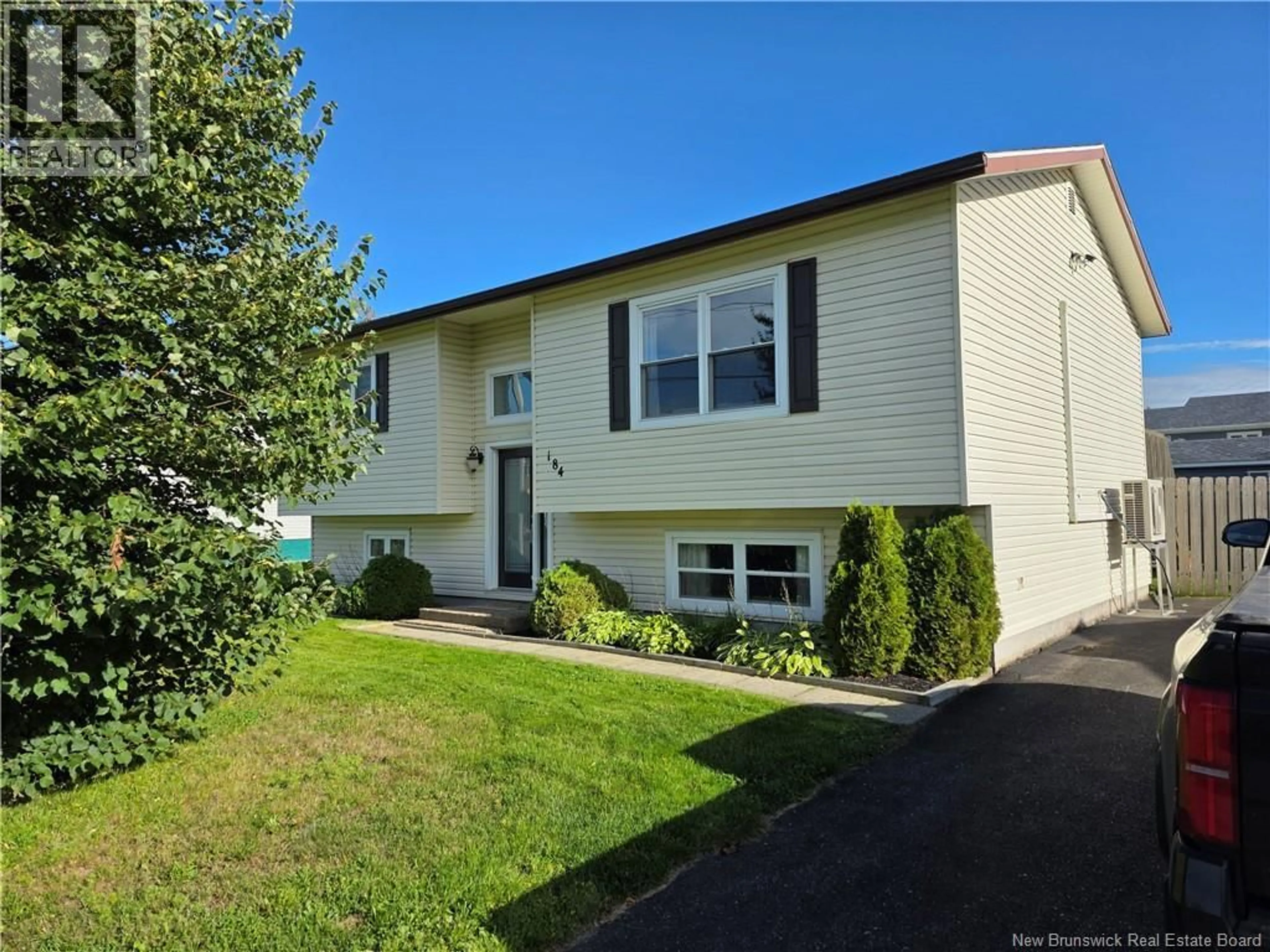 Home with vinyl exterior material, street for 184 GAGNON, Beresford New Brunswick E8K1V3