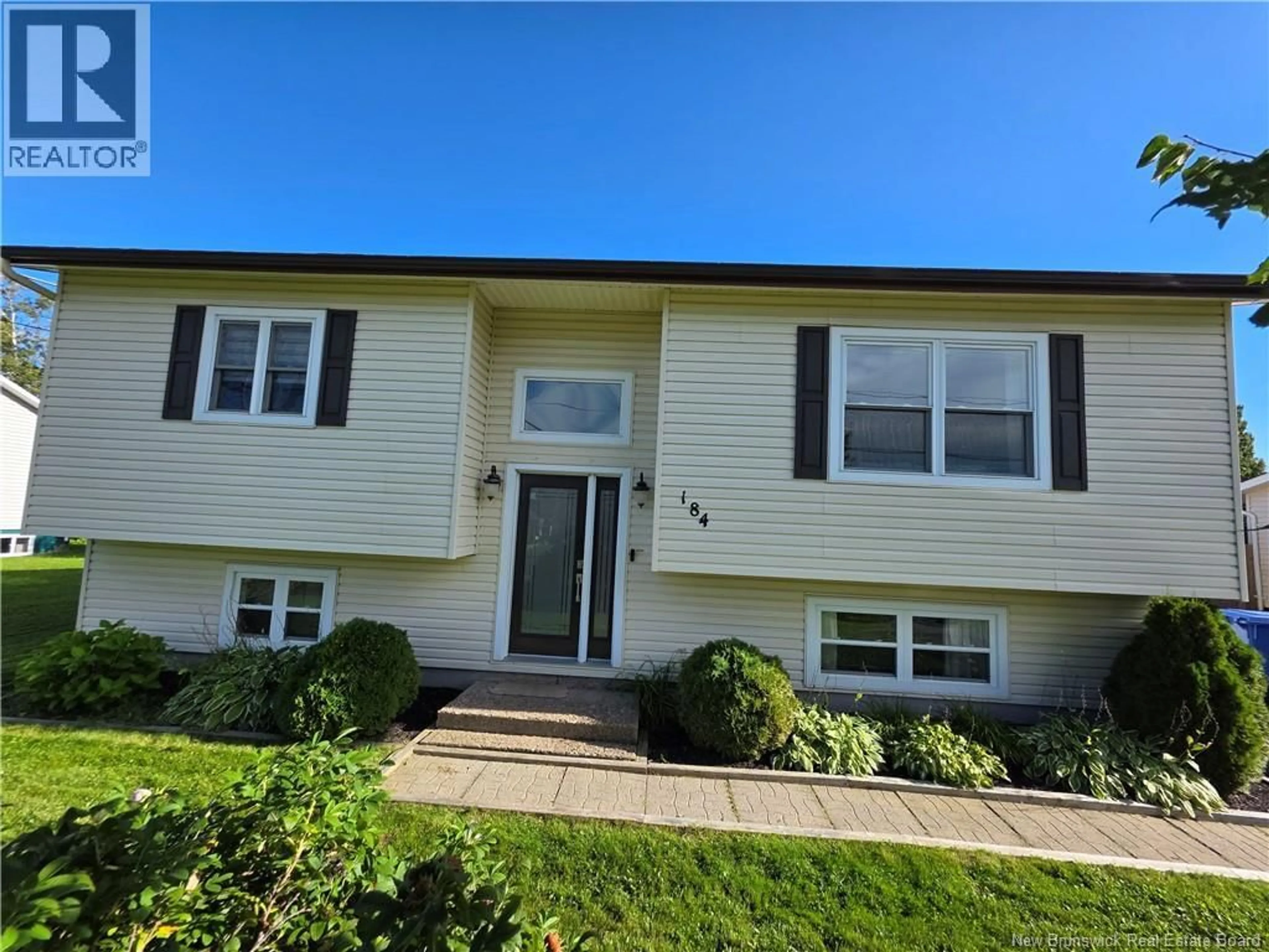 Home with vinyl exterior material, street for 184 GAGNON, Beresford New Brunswick E8K1V3