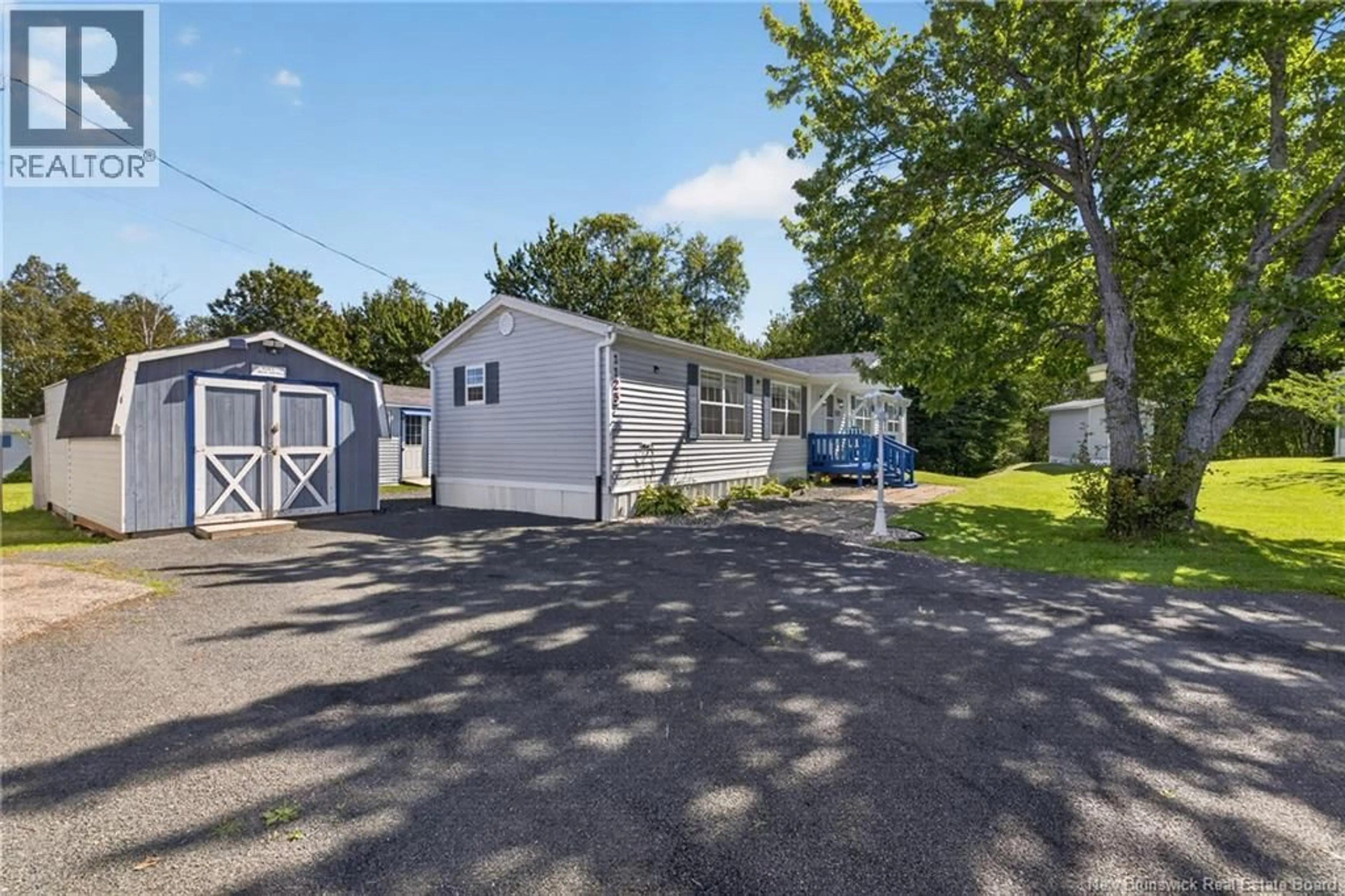 A pic from outside/outdoor area/front of a property/back of a property/a pic from drone, street for 1125 PINE, Beresford New Brunswick E8K1G4