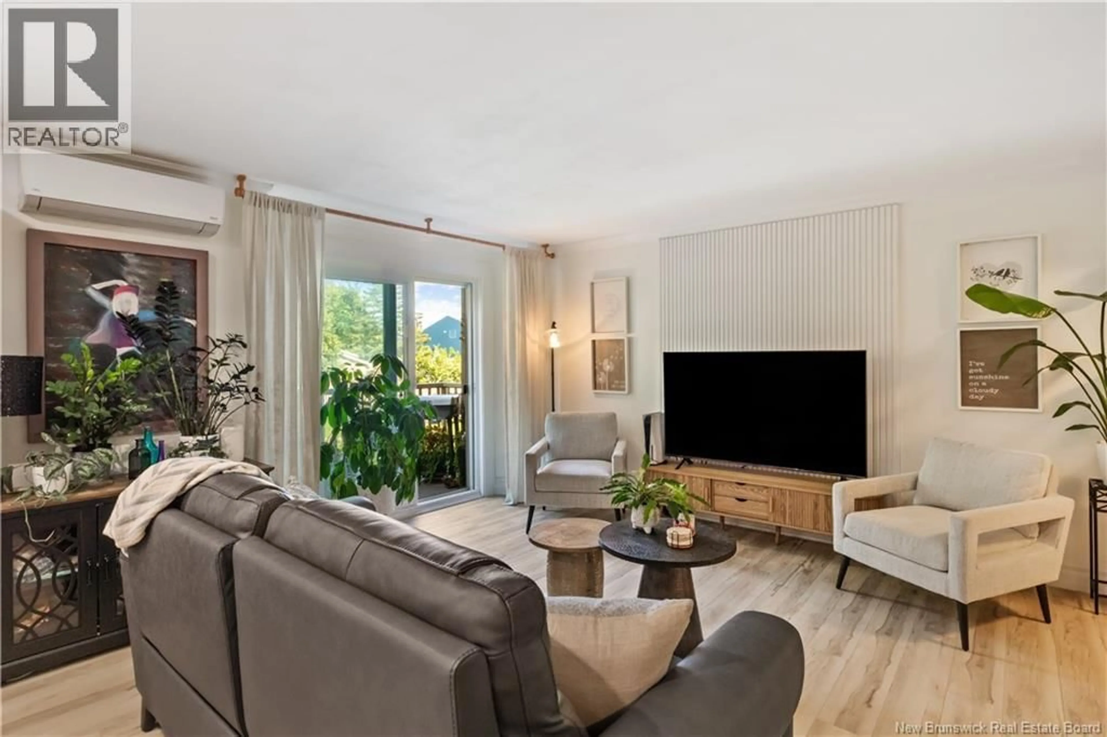 Living room with furniture, unknown for 202 - 98 PLEASANT, Shediac New Brunswick E4P2L6