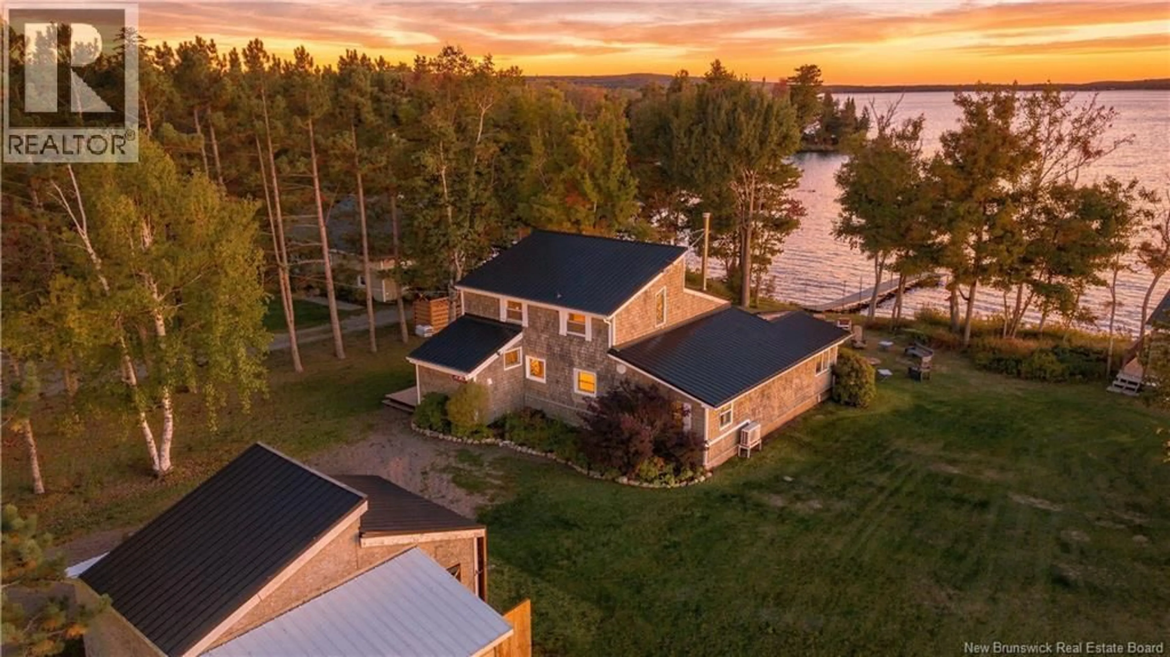 A pic from outside/outdoor area/front of a property/back of a property/a pic from drone, water/lake/river/ocean view for 87 HAZEN LANE, Harvey New Brunswick E6K2N9