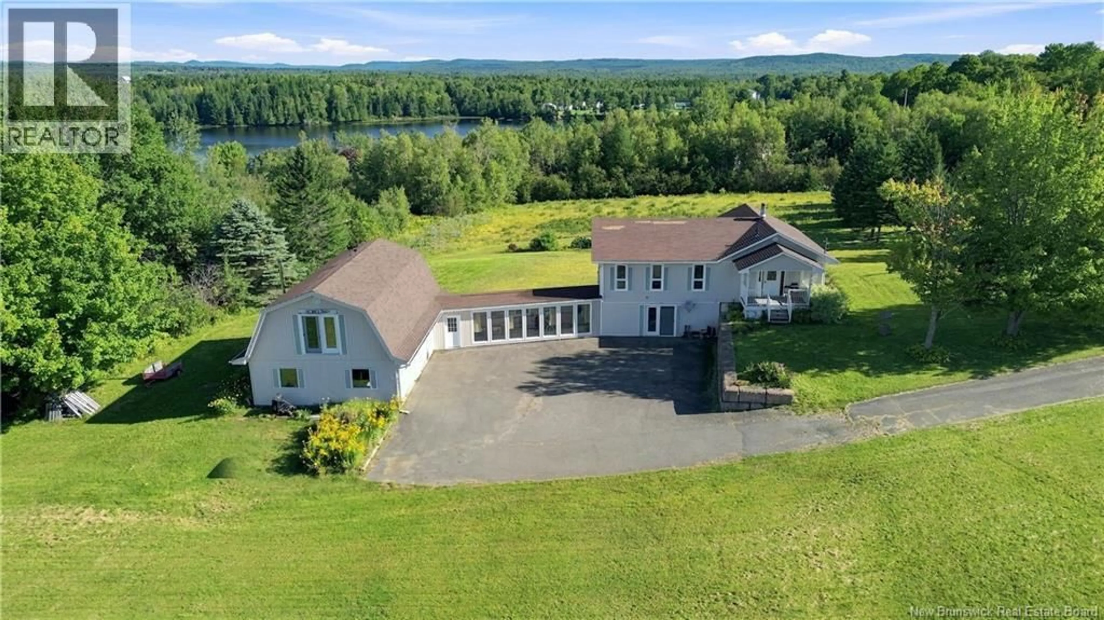 A pic from outside/outdoor area/front of a property/back of a property/a pic from drone, water/lake/river/ocean view for 100 GREEN HILL LAKE ROAD, Greenhill Lake New Brunswick E6E1E9