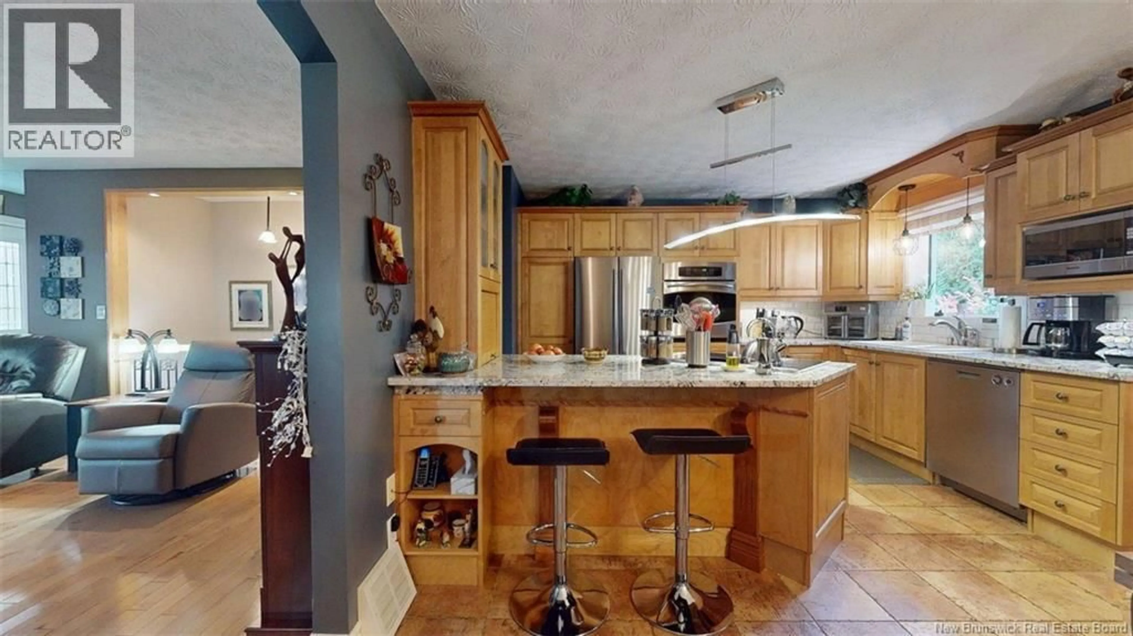 Open concept kitchen, ceramic/tile floor for 43 BELISLE AVENUE, Edmundston New Brunswick E3V3W9