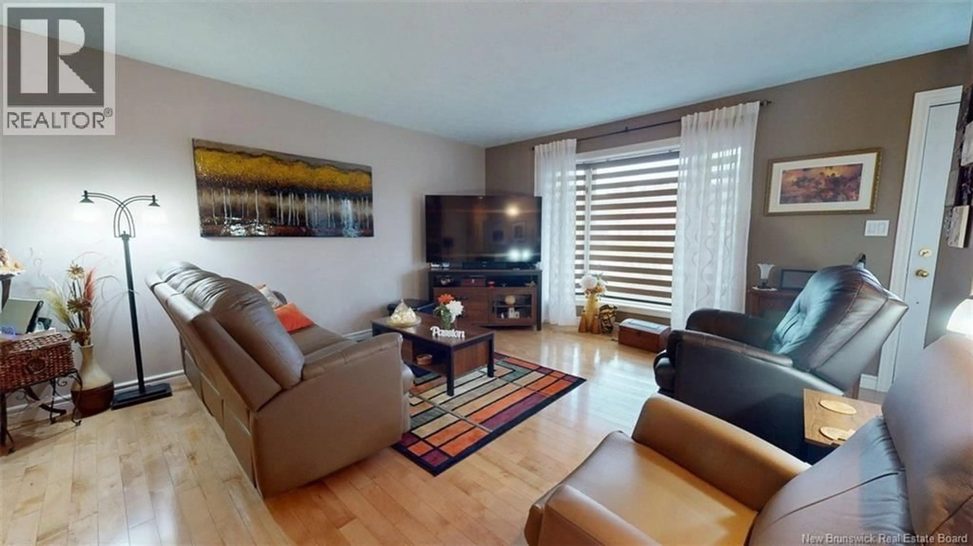 Living room with furniture, wood/laminate floor for 43 BELISLE AVENUE, Edmundston New Brunswick E3V3W9