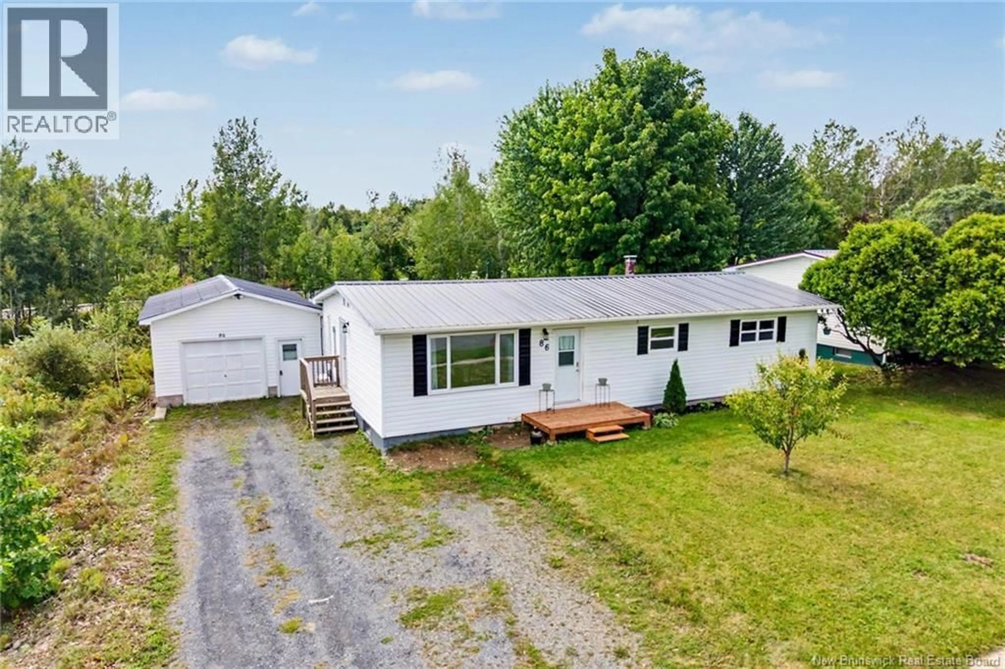 A pic from outside/outdoor area/front of a property/back of a property/a pic from drone, unknown for 86 LANDEGGER DRIVE, Nackawic New Brunswick E6G1G2