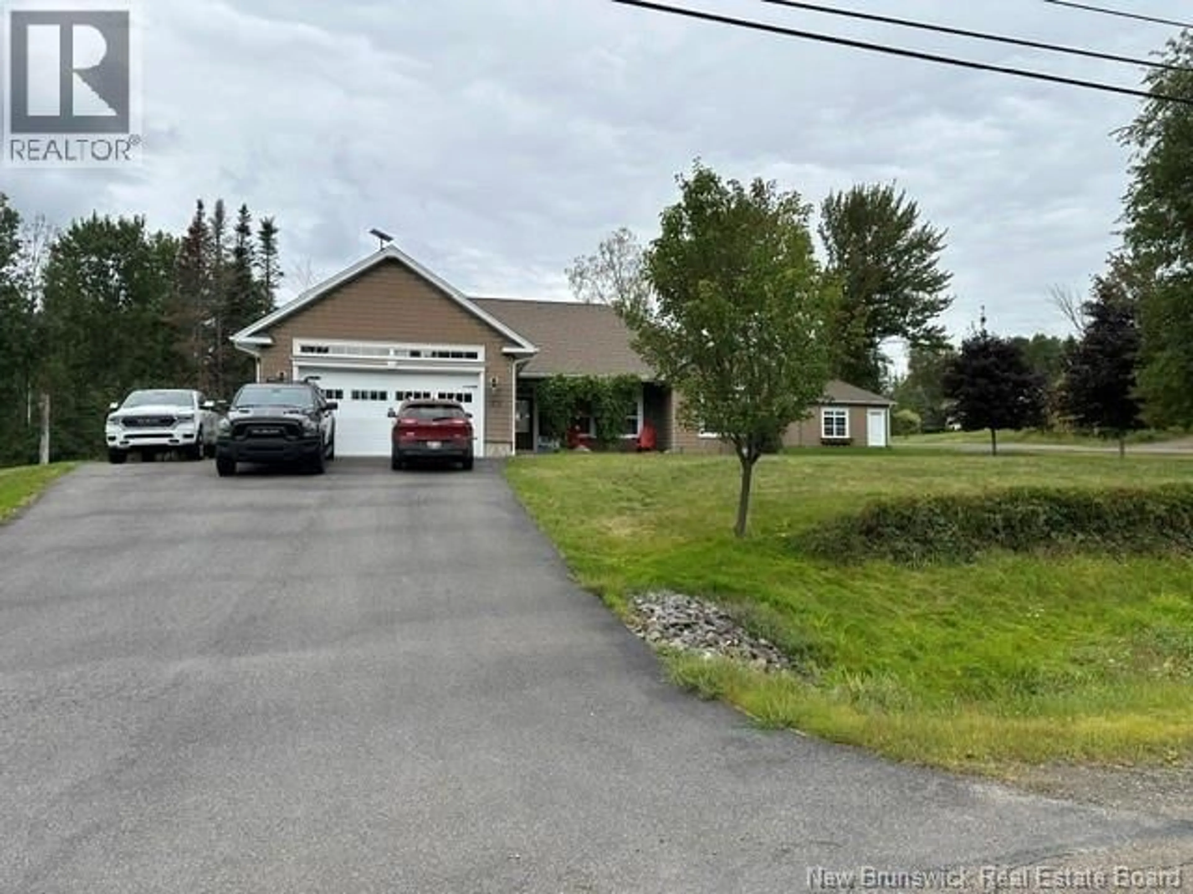 A pic from outside/outdoor area/front of a property/back of a property/a pic from drone, street for 23 HIGHFIELD ROAD, Douglas New Brunswick E3G7P6