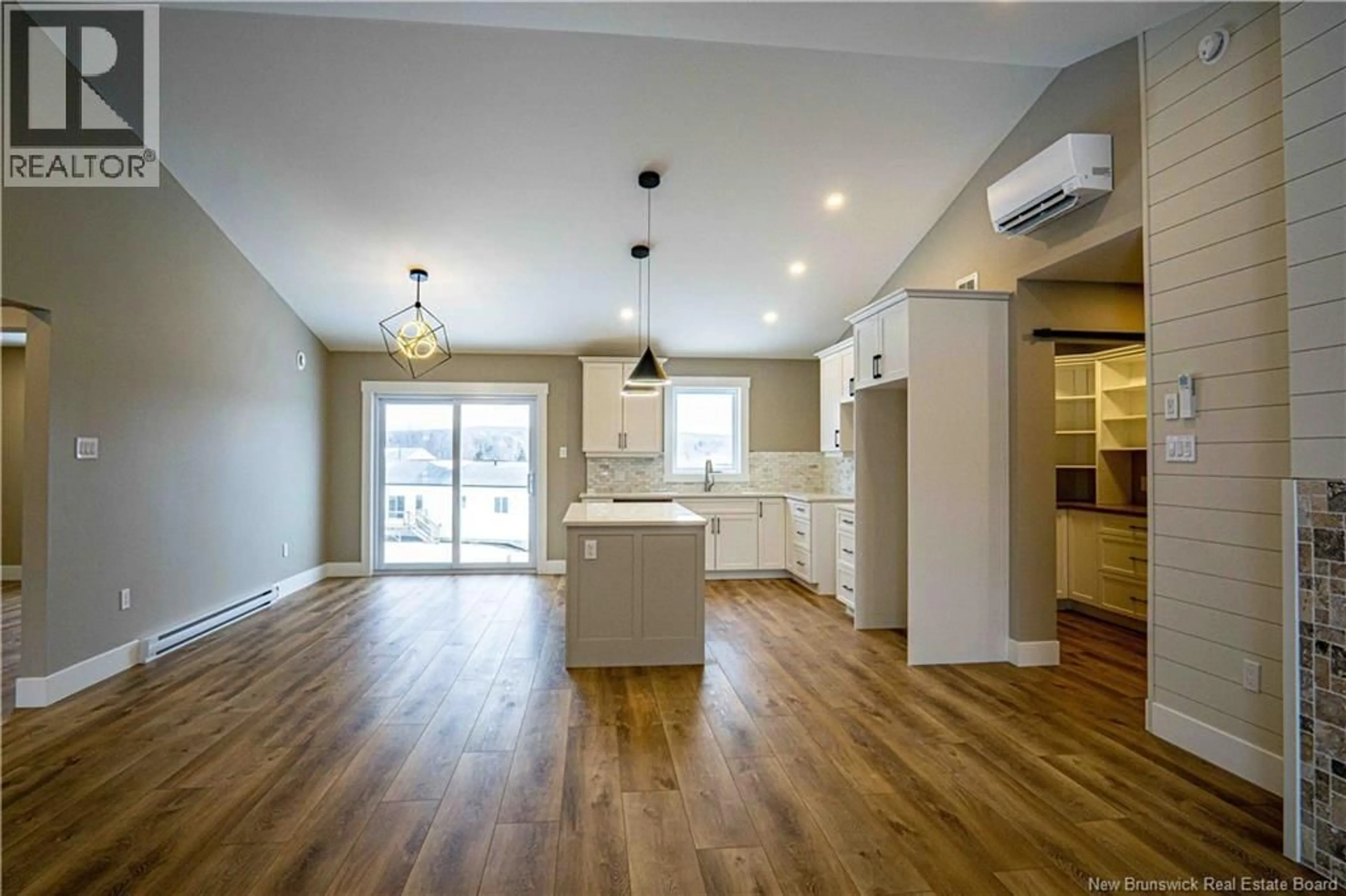 Open concept kitchen, wood/laminate floor for 13 GEYSSEN COURT, Fredericton New Brunswick E3G0K8