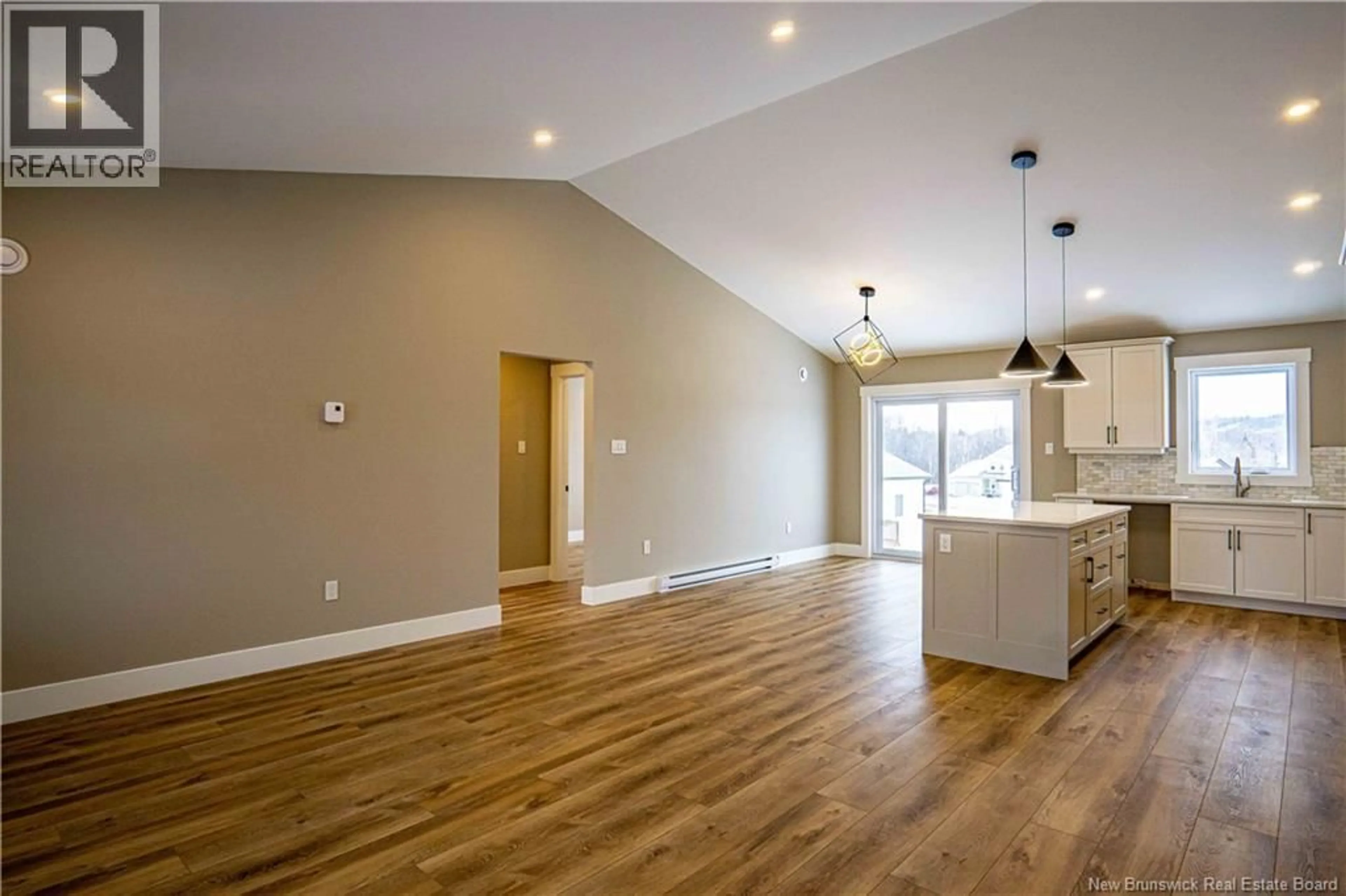 Open concept kitchen, wood/laminate floor for 13 GEYSSEN COURT, Fredericton New Brunswick E3G0K8