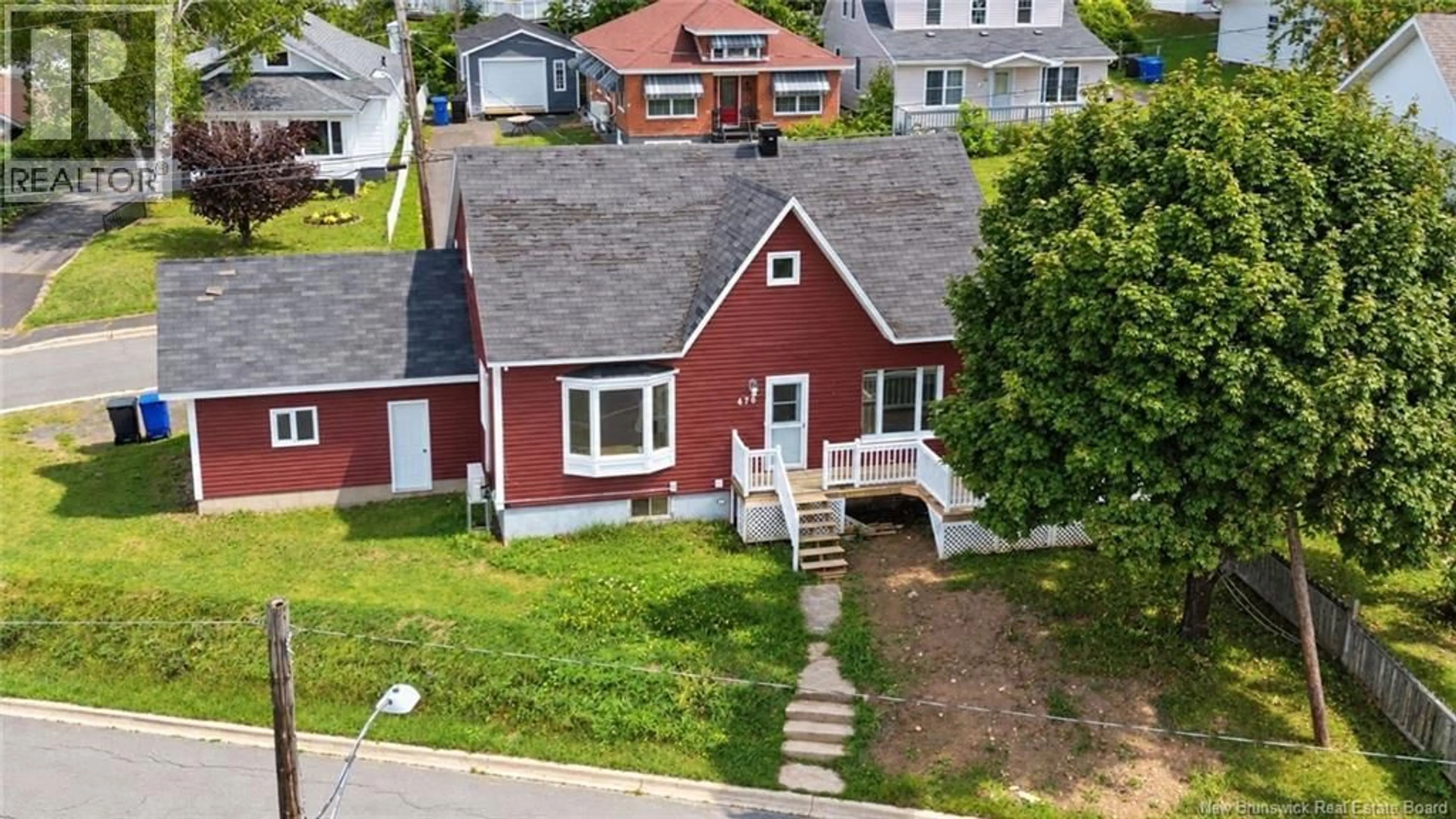 A pic from outside/outdoor area/front of a property/back of a property/a pic from drone, street for 470 RIVERSIDE DRIVE, Bathurst New Brunswick E2A2M1