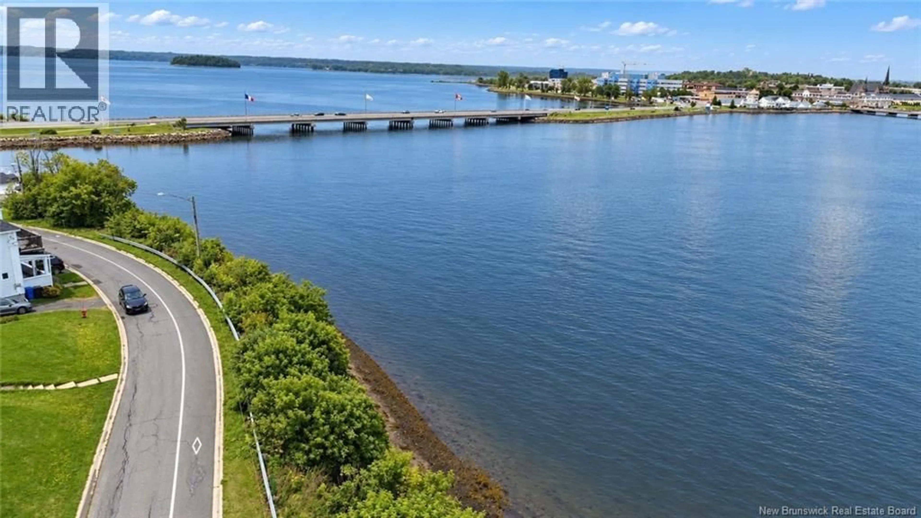 A pic from outside/outdoor area/front of a property/back of a property/a pic from drone, water/lake/river/ocean view for 470 RIVERSIDE DRIVE, Bathurst New Brunswick E2A2M1