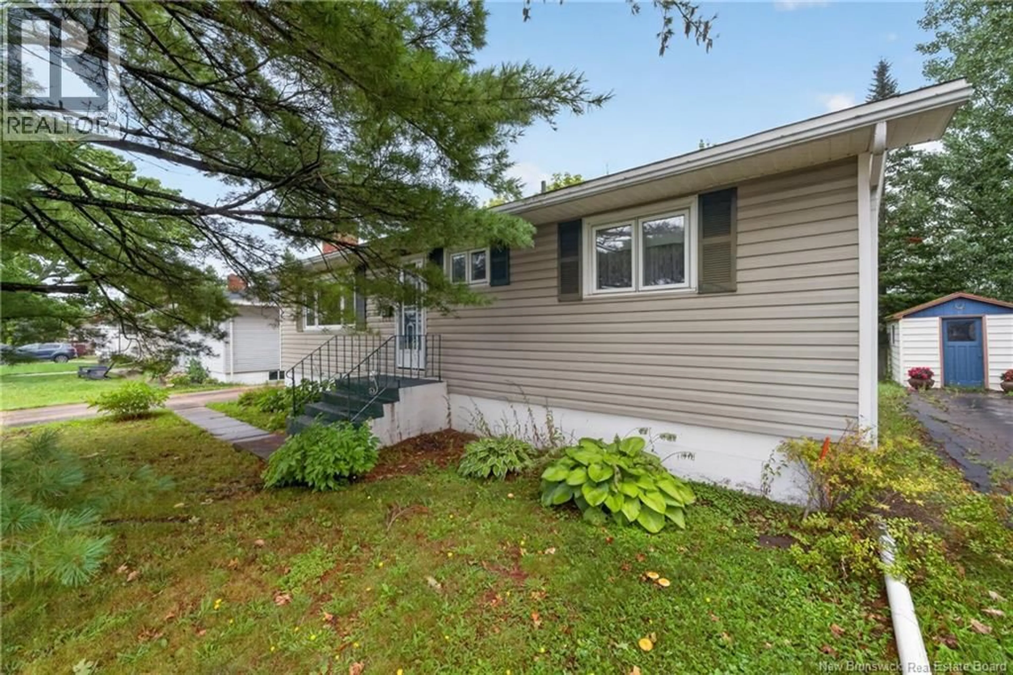 Home with vinyl exterior material, street for 25 POIRIER, Moncton New Brunswick E1C7R9