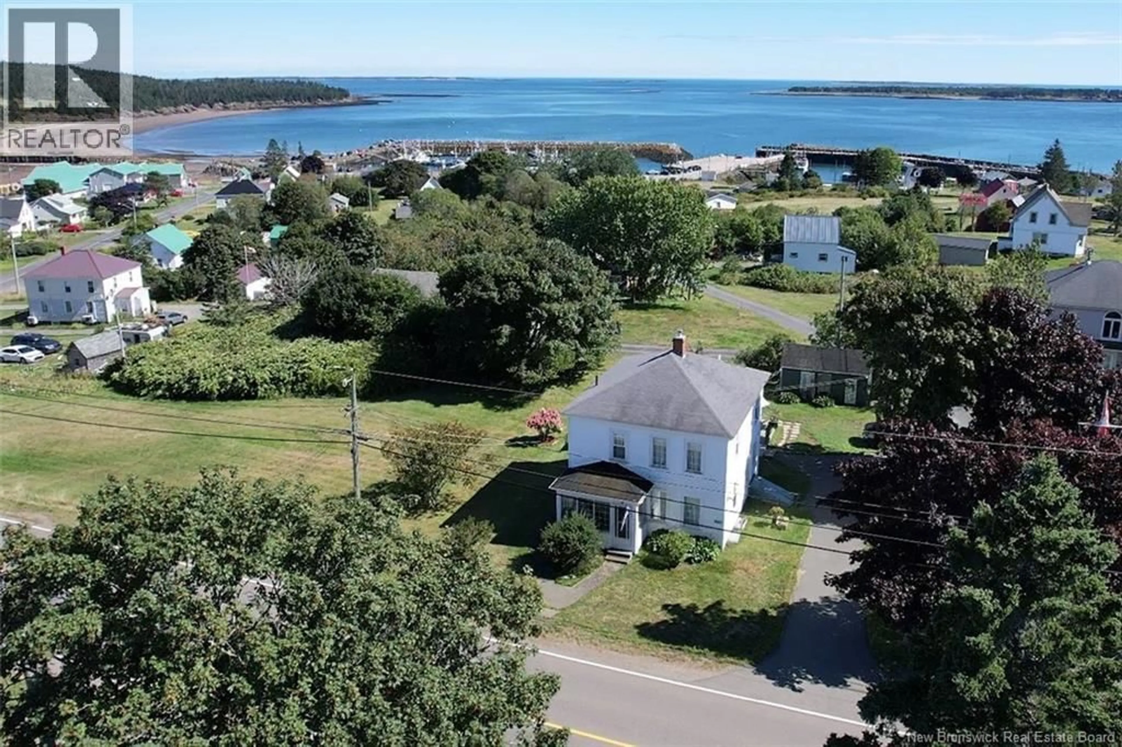 A pic from outside/outdoor area/front of a property/back of a property/a pic from drone, water/lake/river/ocean view for 1909 ROUTE 776, Grand Manan New Brunswick E5G3H1