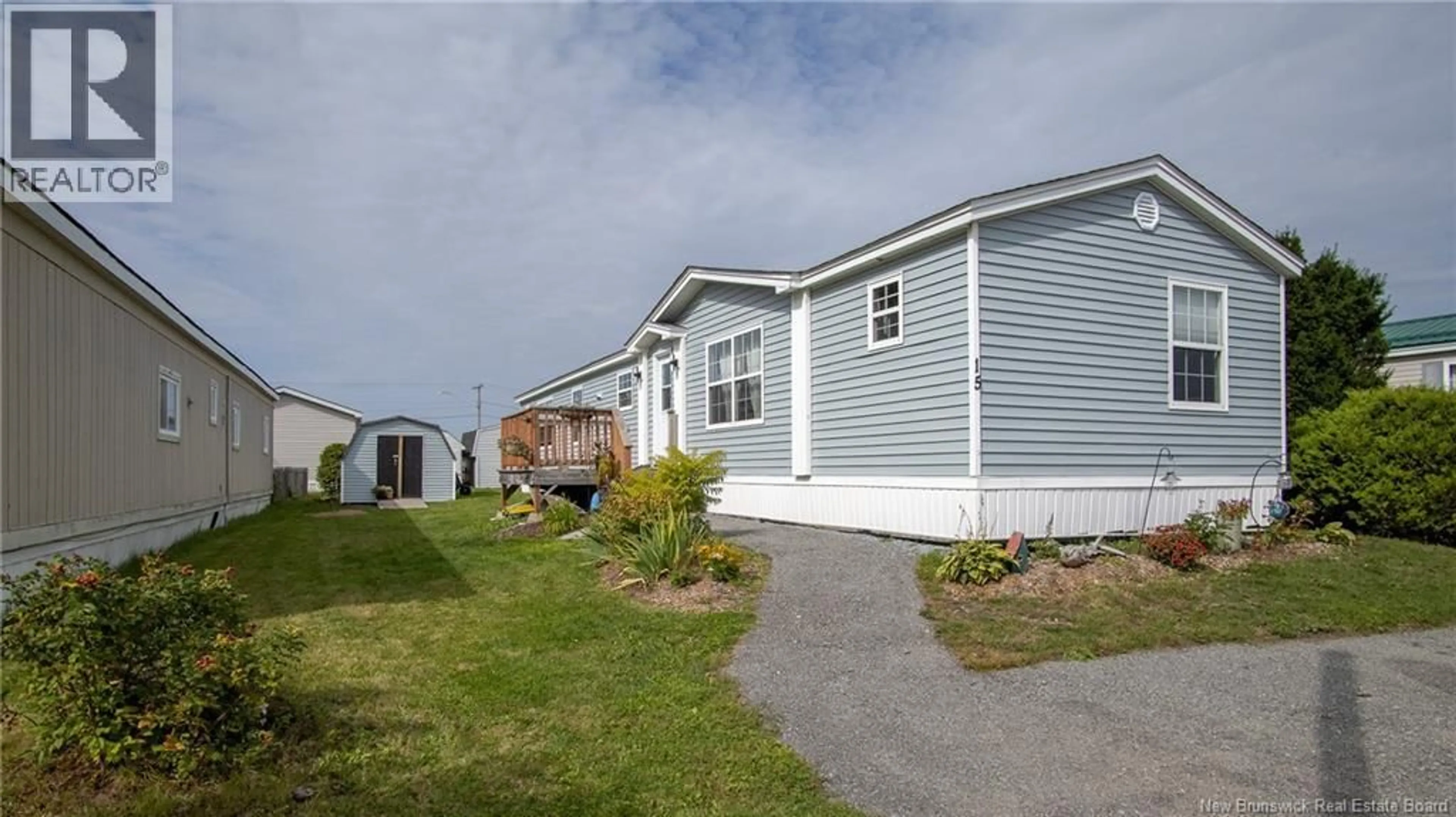 Home with vinyl exterior material, street for 15 DWAYNE AVENUE, Quispamsis New Brunswick E2G1S5